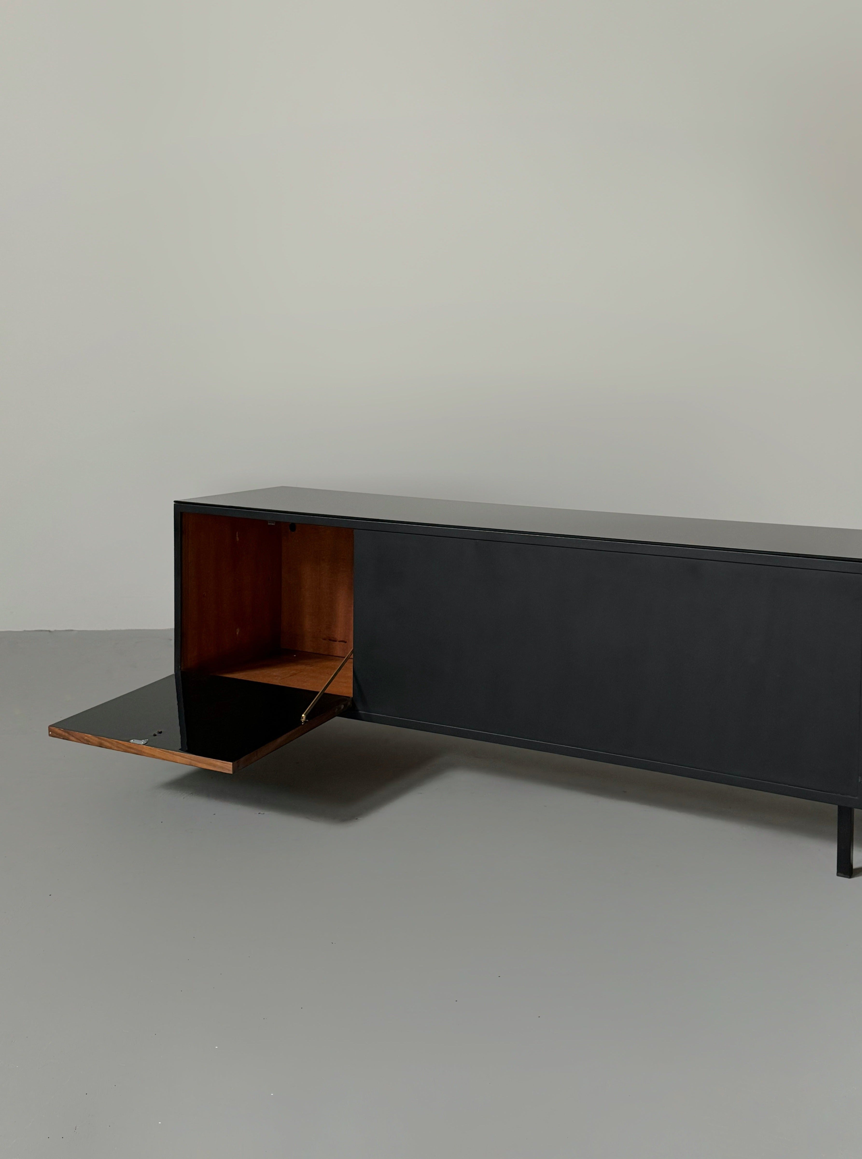 Mid-century French sideboard in teak and black glass top