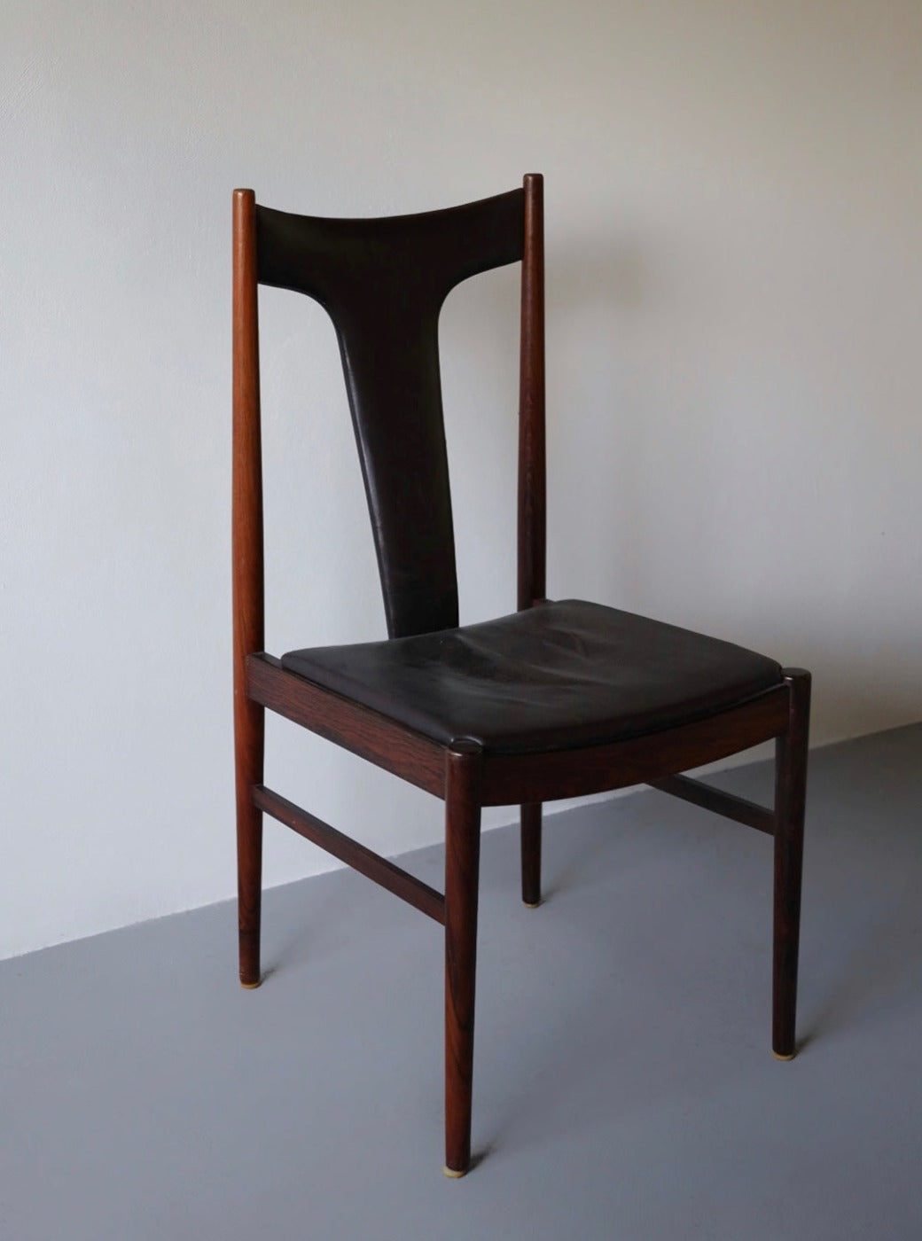 High backed side chair in rosewood by Helge Sibast