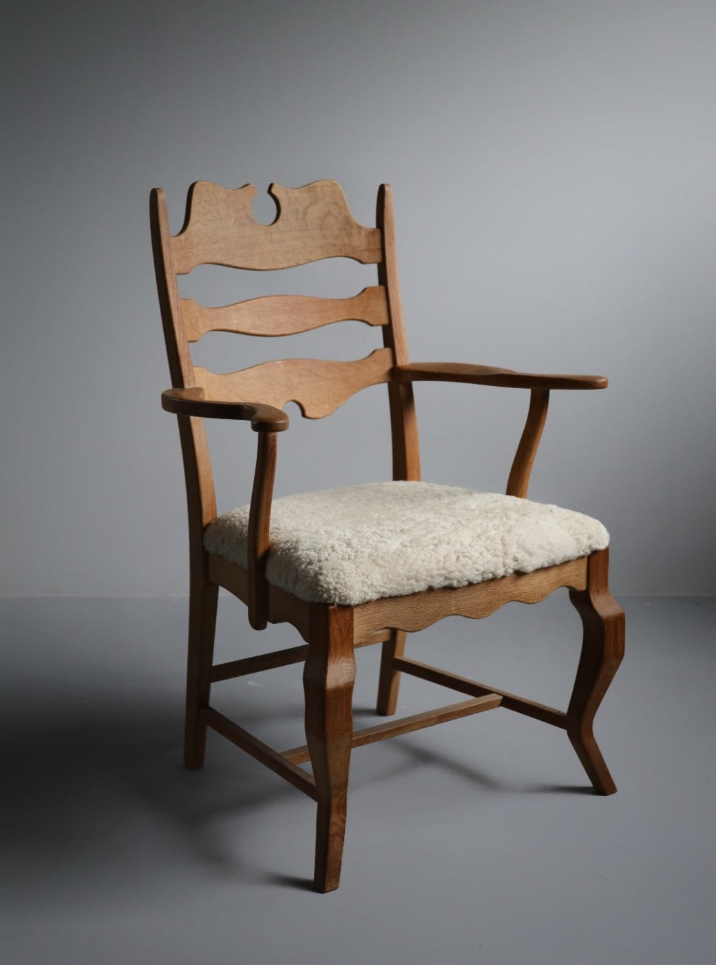 Razor blade dining chair in oak by Henry Kjærnulf