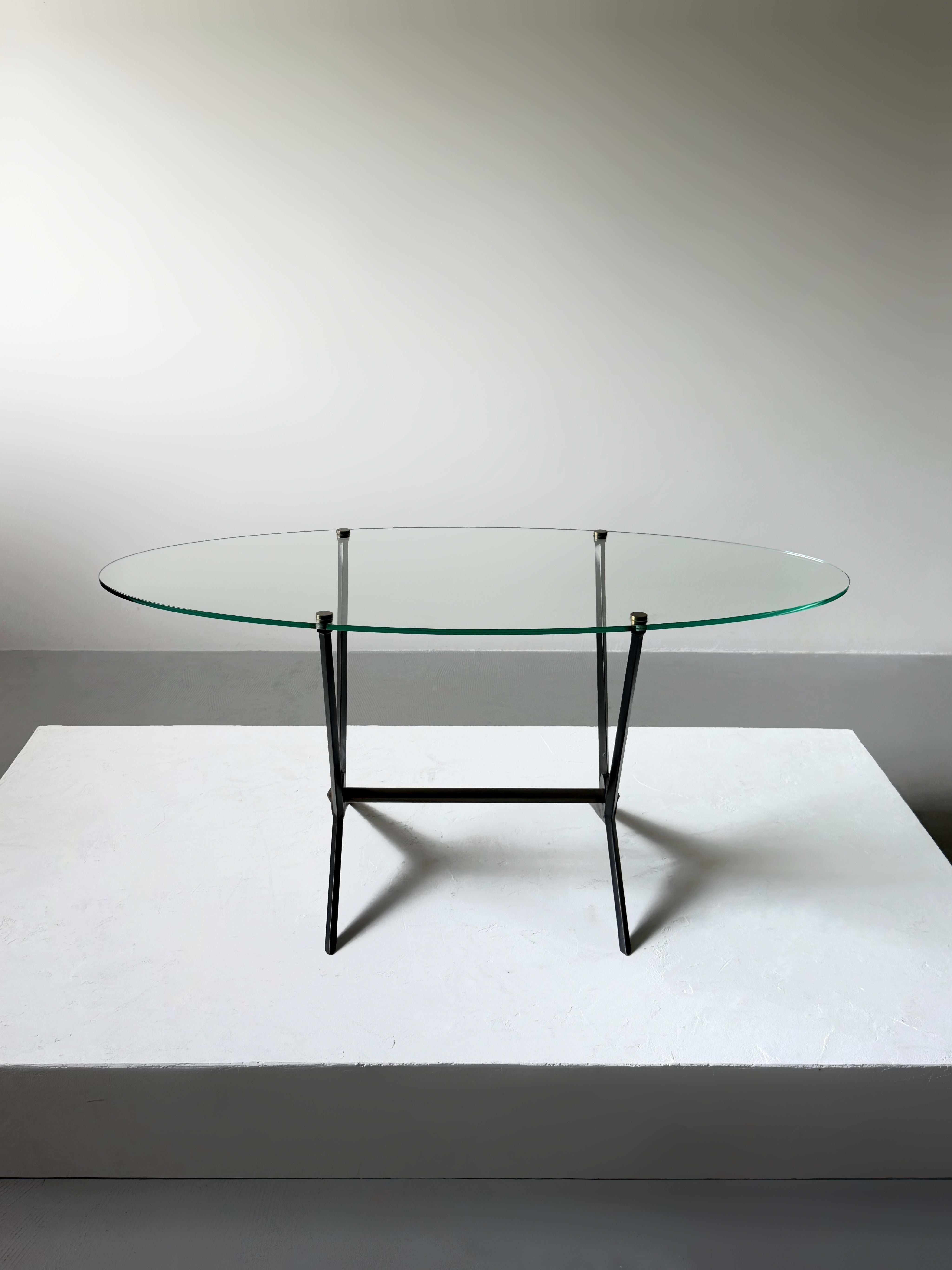 Oval coffee table by Angelo Ostuni in metal and glass, Italy 1950