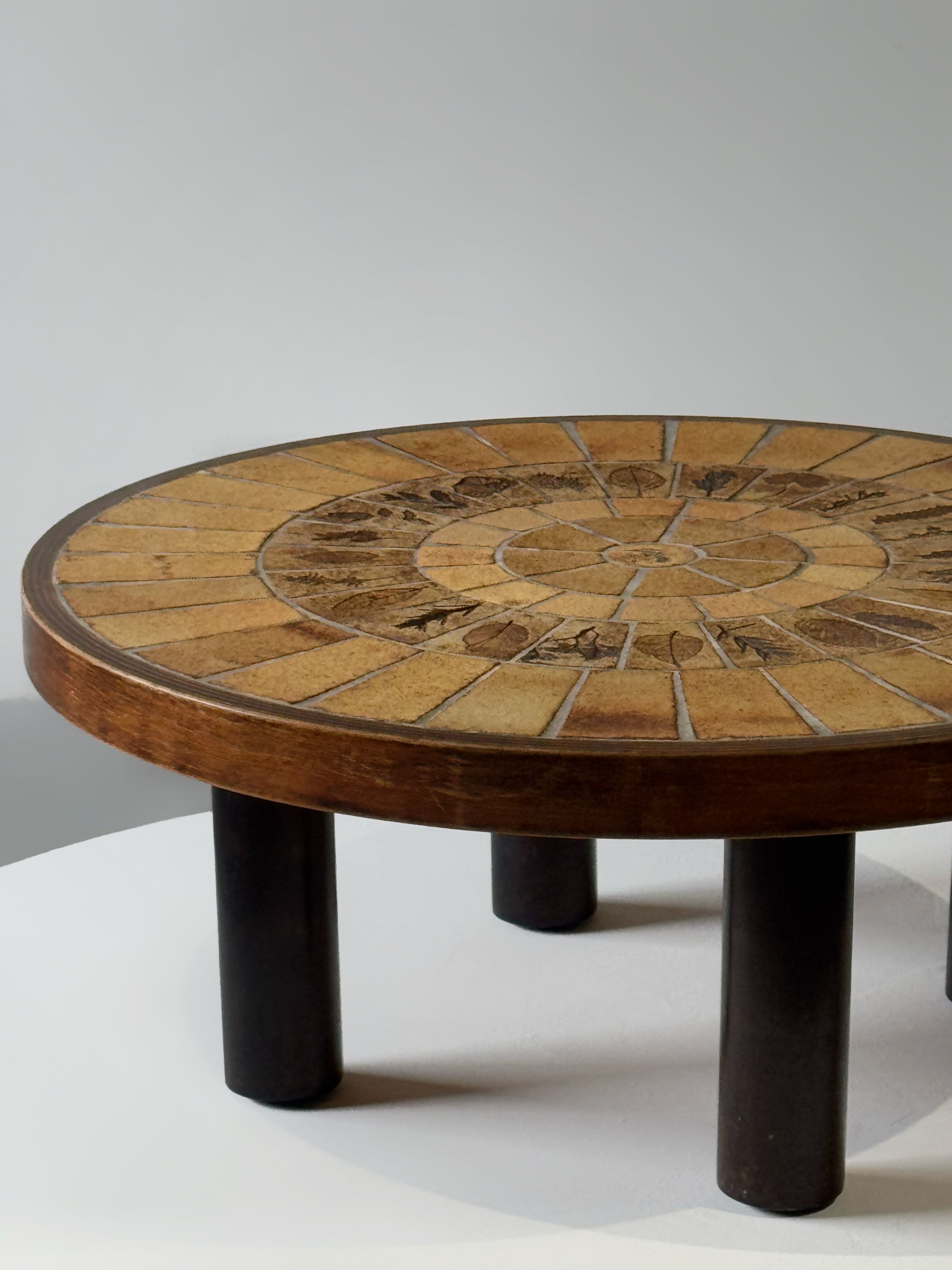 Low round coffee table by Roger Capron