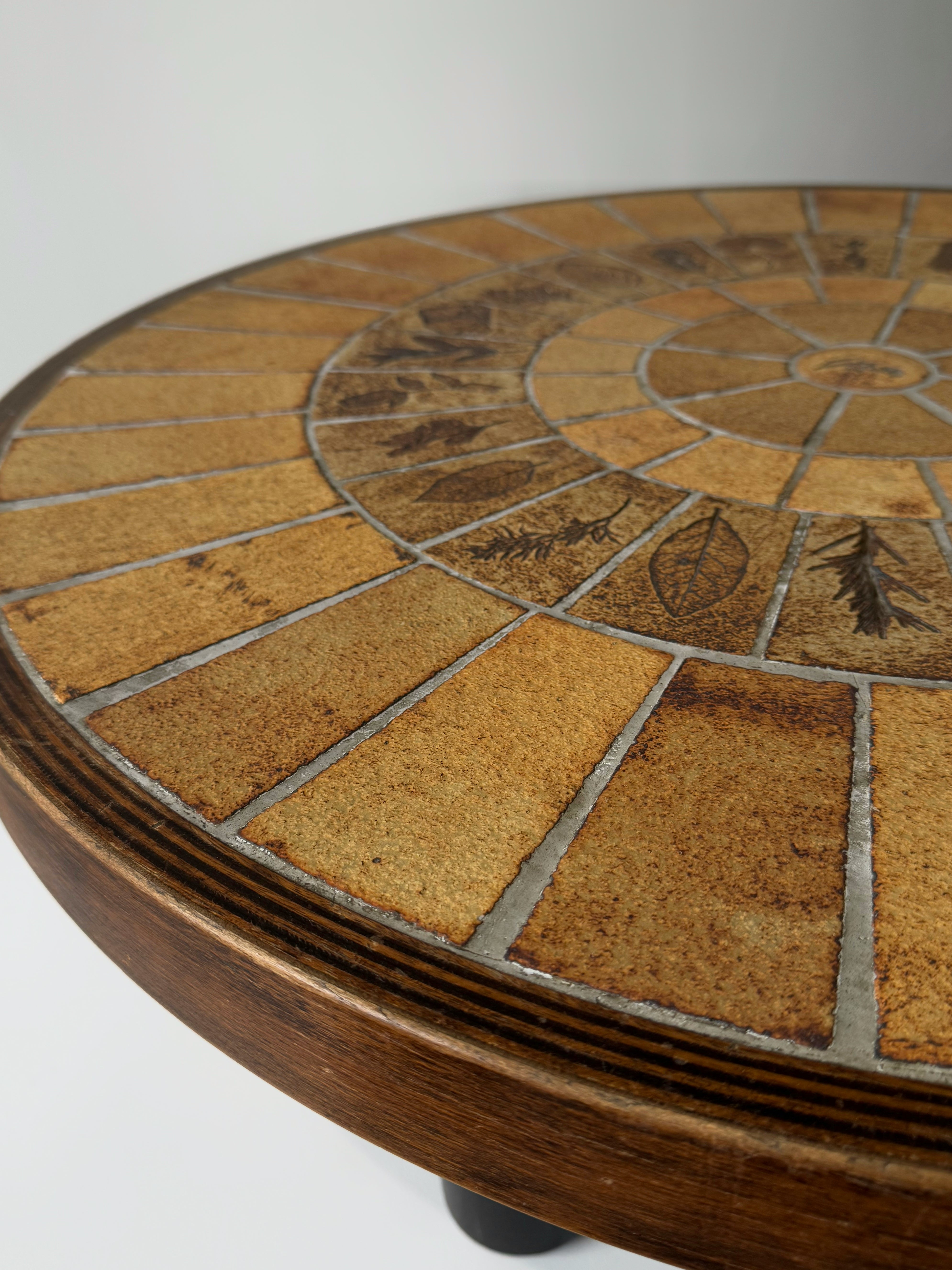 Low round coffee table by Roger Capron