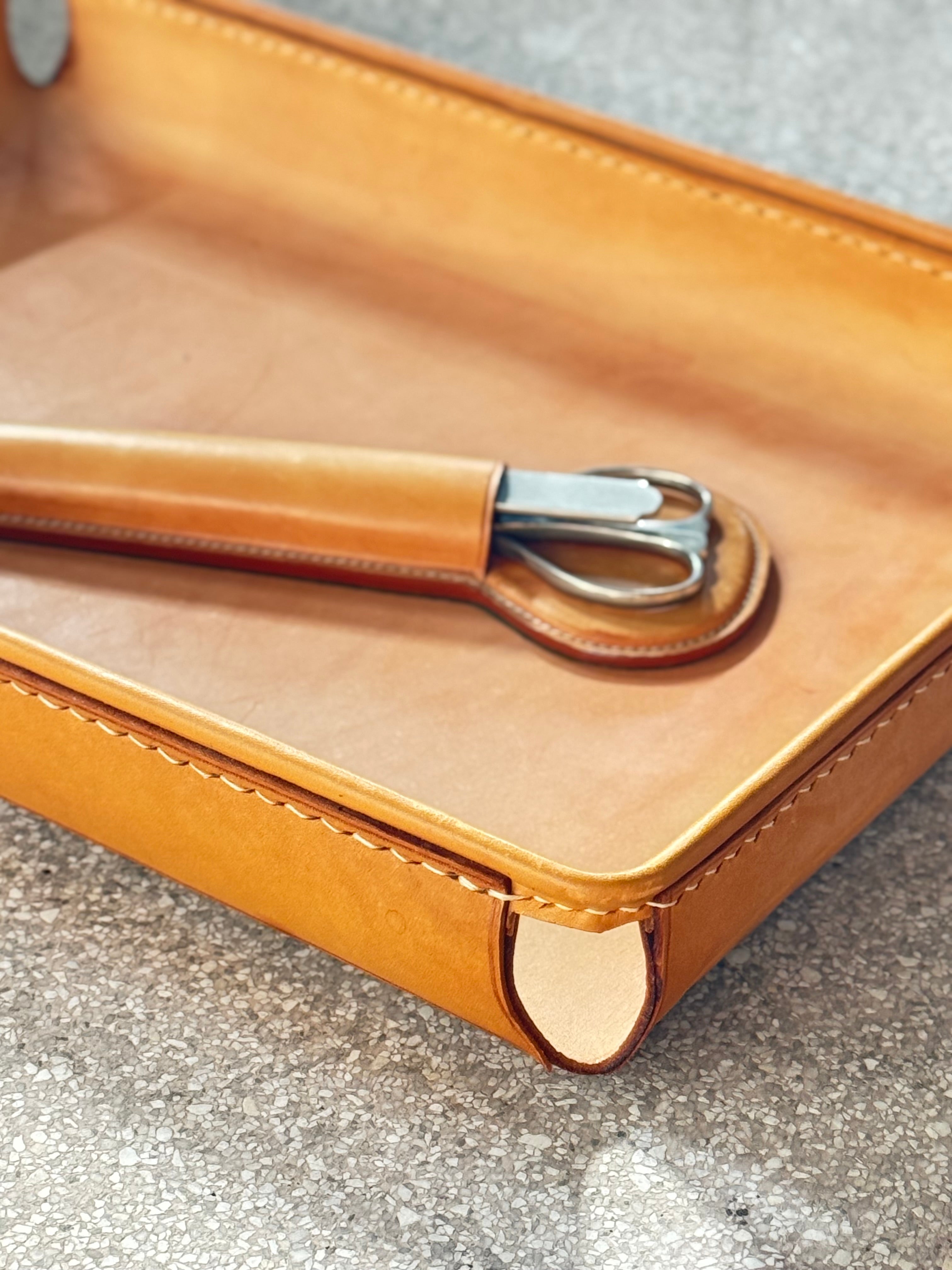 Leather tray Designed by Carl Auböck