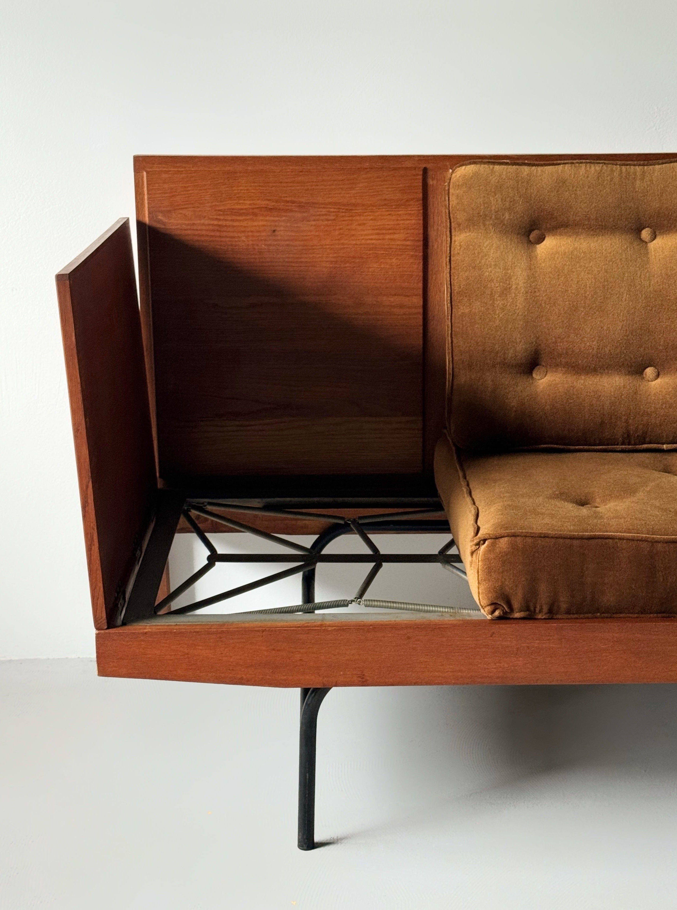 Vintage sofa "day and night" by Pierre Guariche