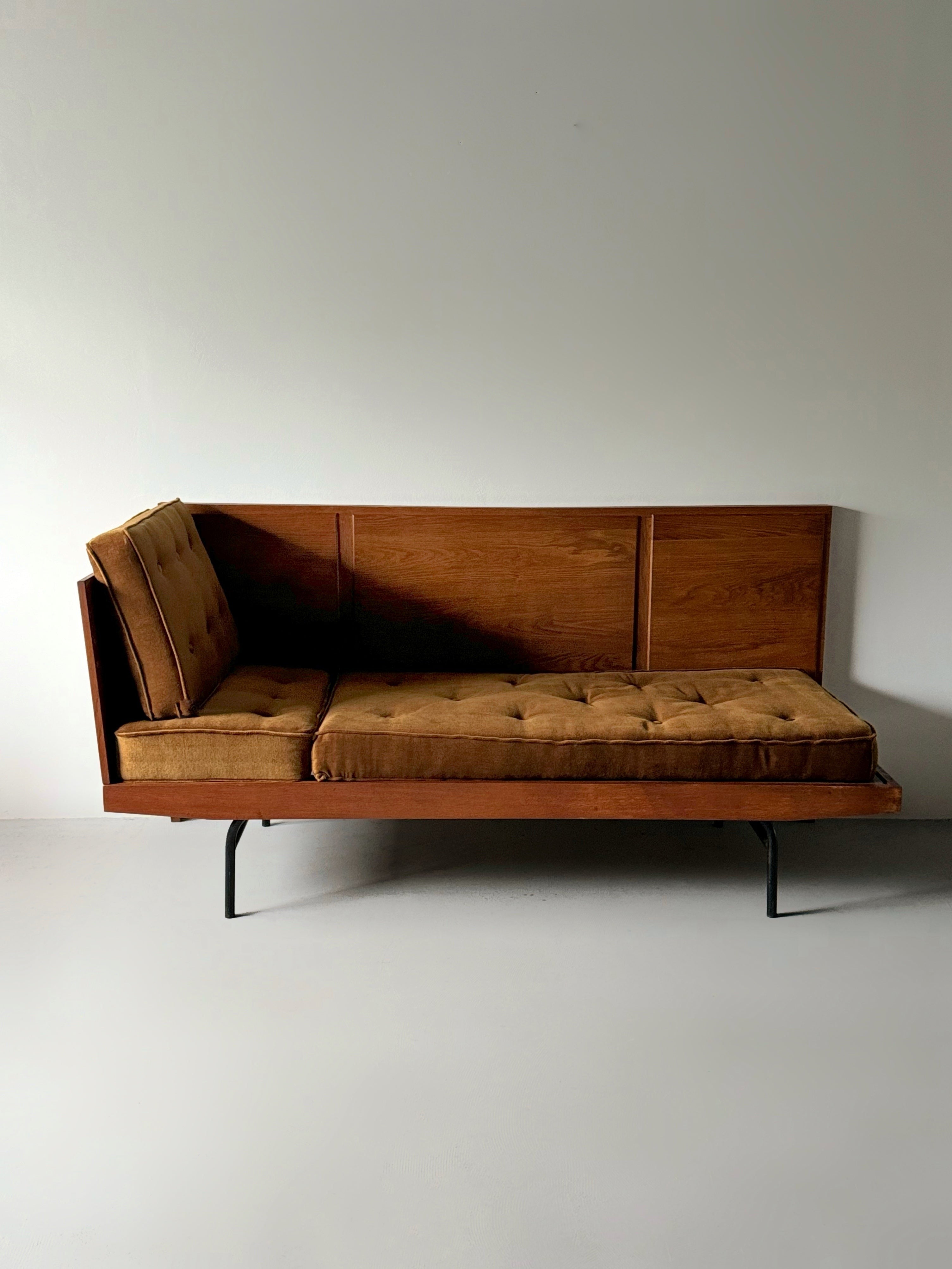 Vintage sofa "day and night" by Pierre Guariche