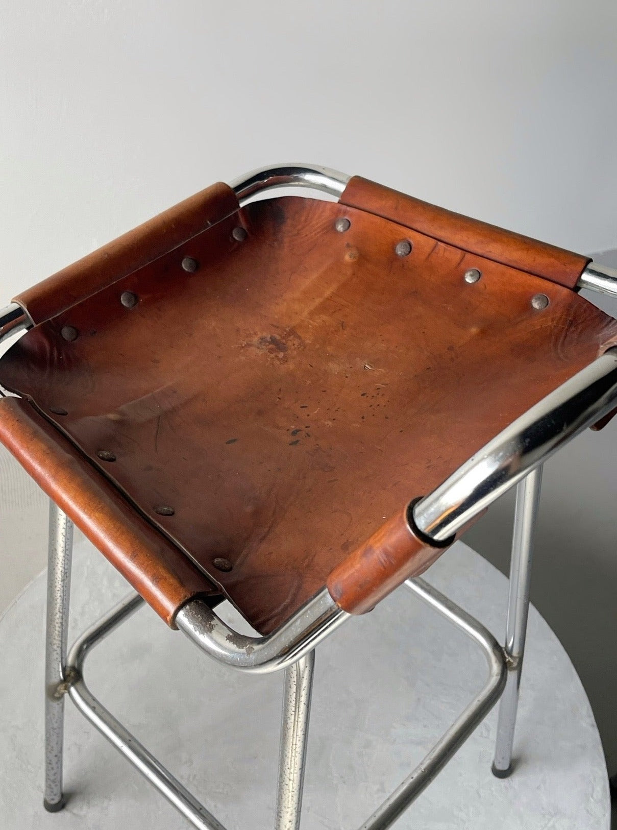 Les Arcs bar stool selected by Charlotte Perriand