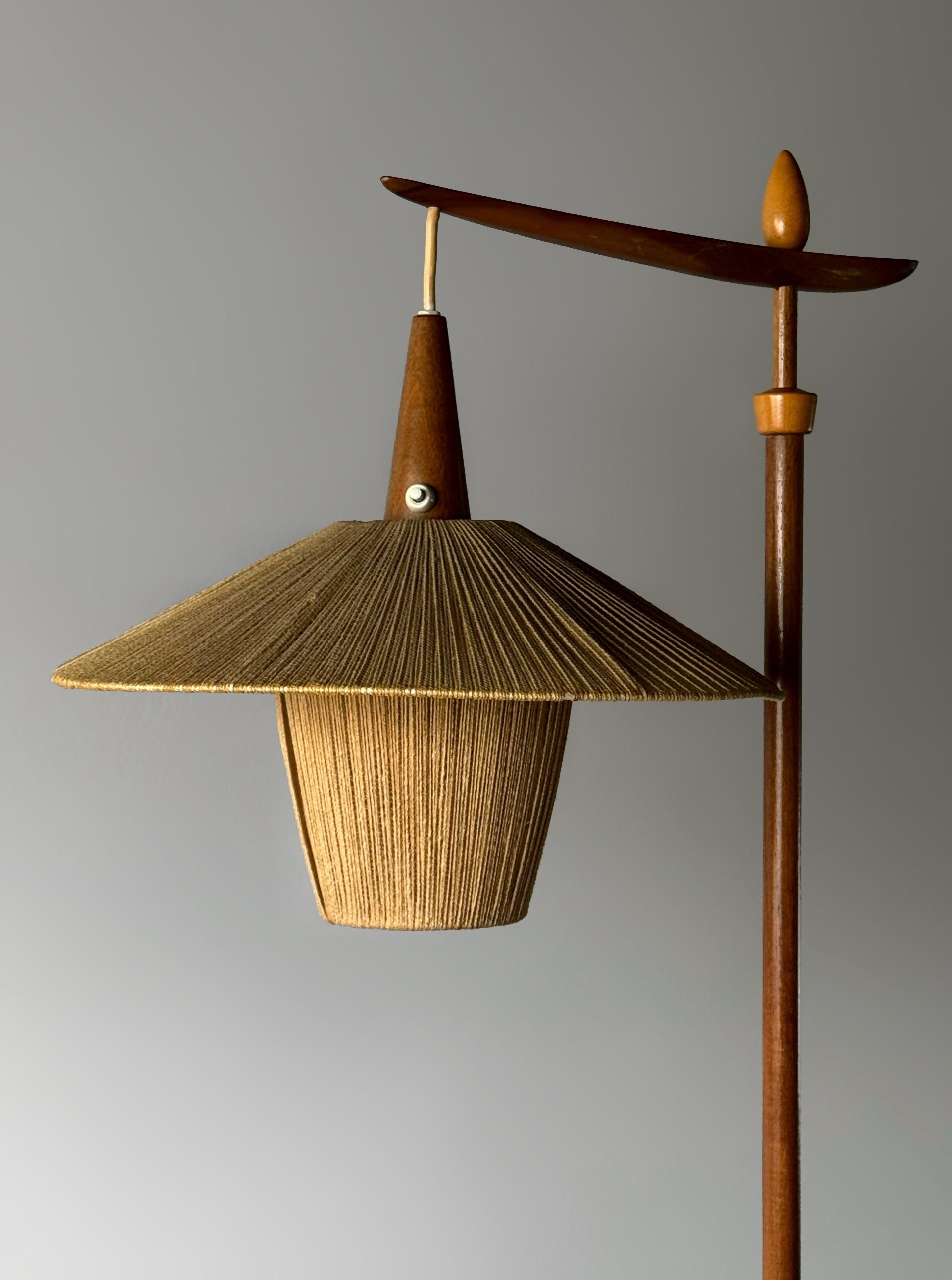 Floor lamp with cord shade manufactured by Temde Leuchten