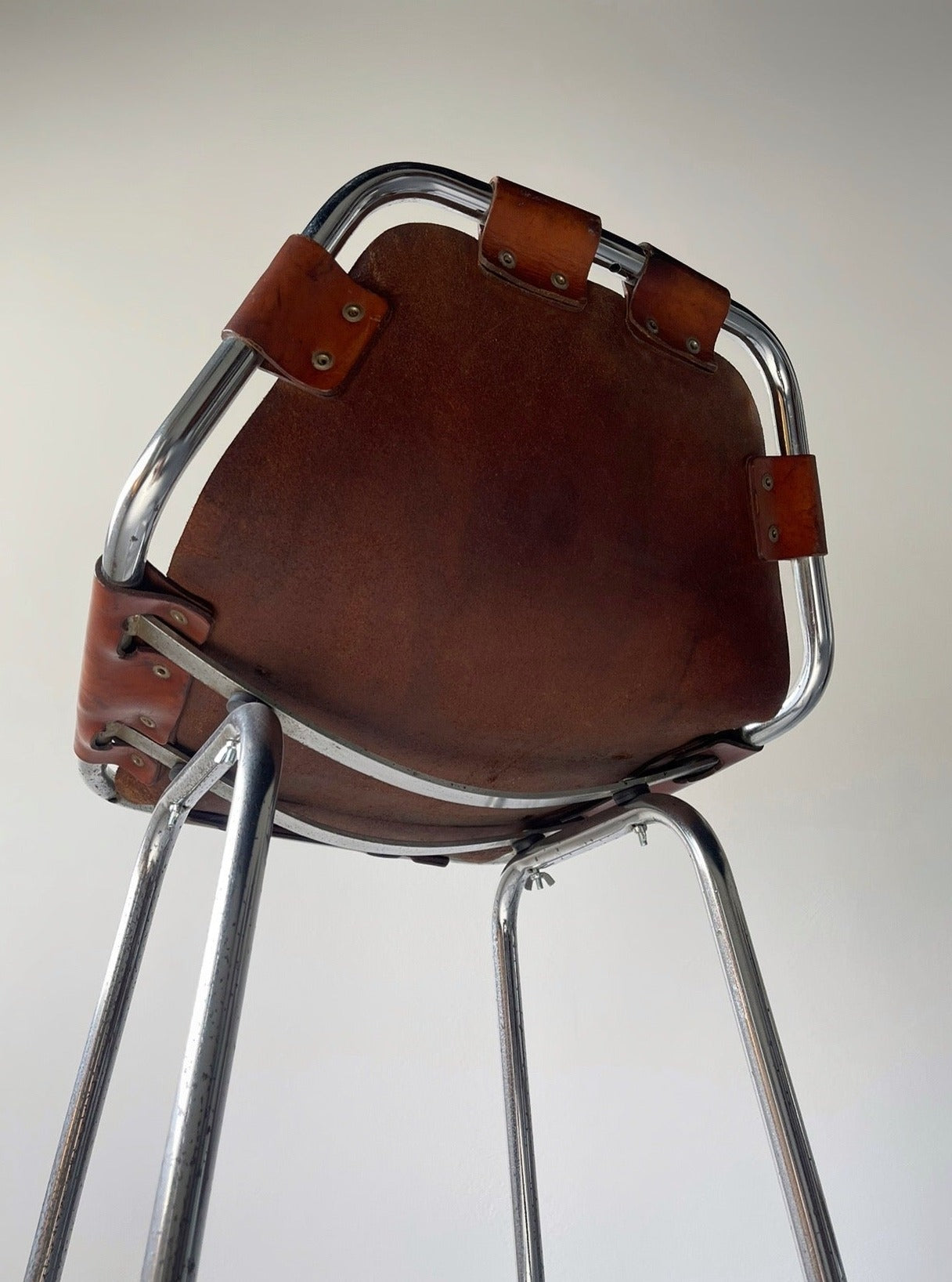 Les Arcs bar stool selected by Charlotte Perriand