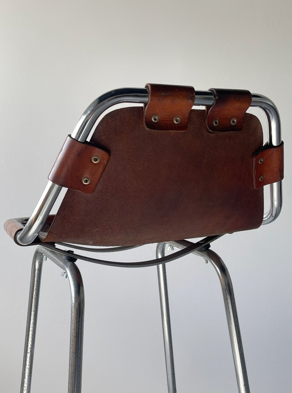 Les Arcs bar stool selected by Charlotte Perriand