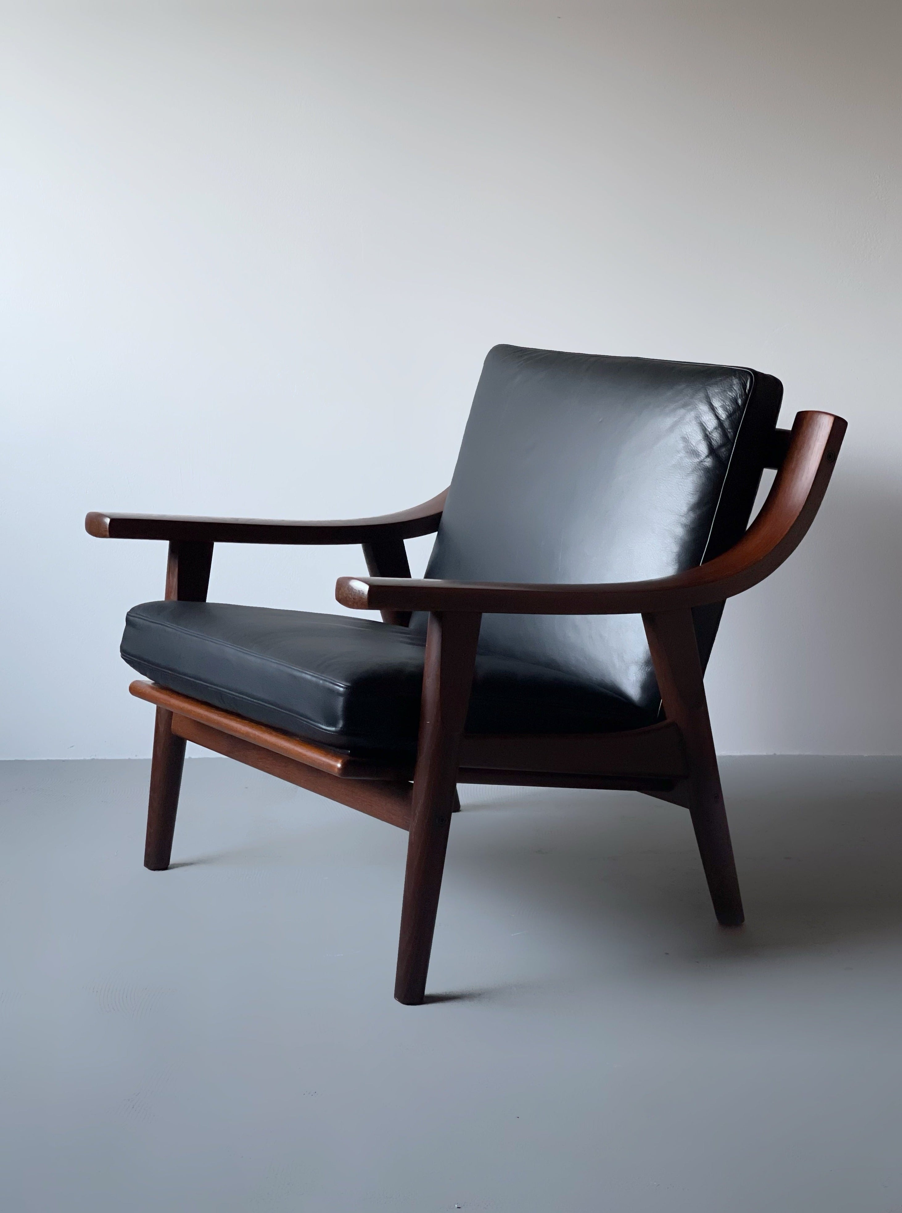 GE530 in dark stained oak by Hans J. Wegner