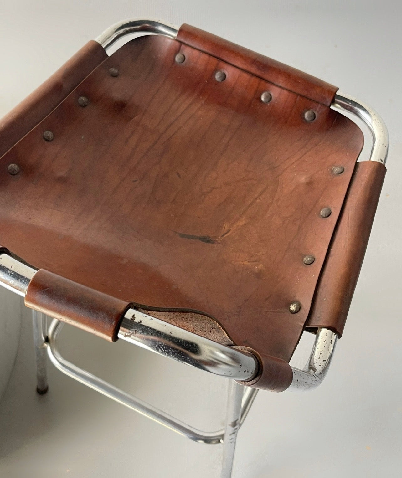 Les Arcs bar stool selected by Charlotte Perriand