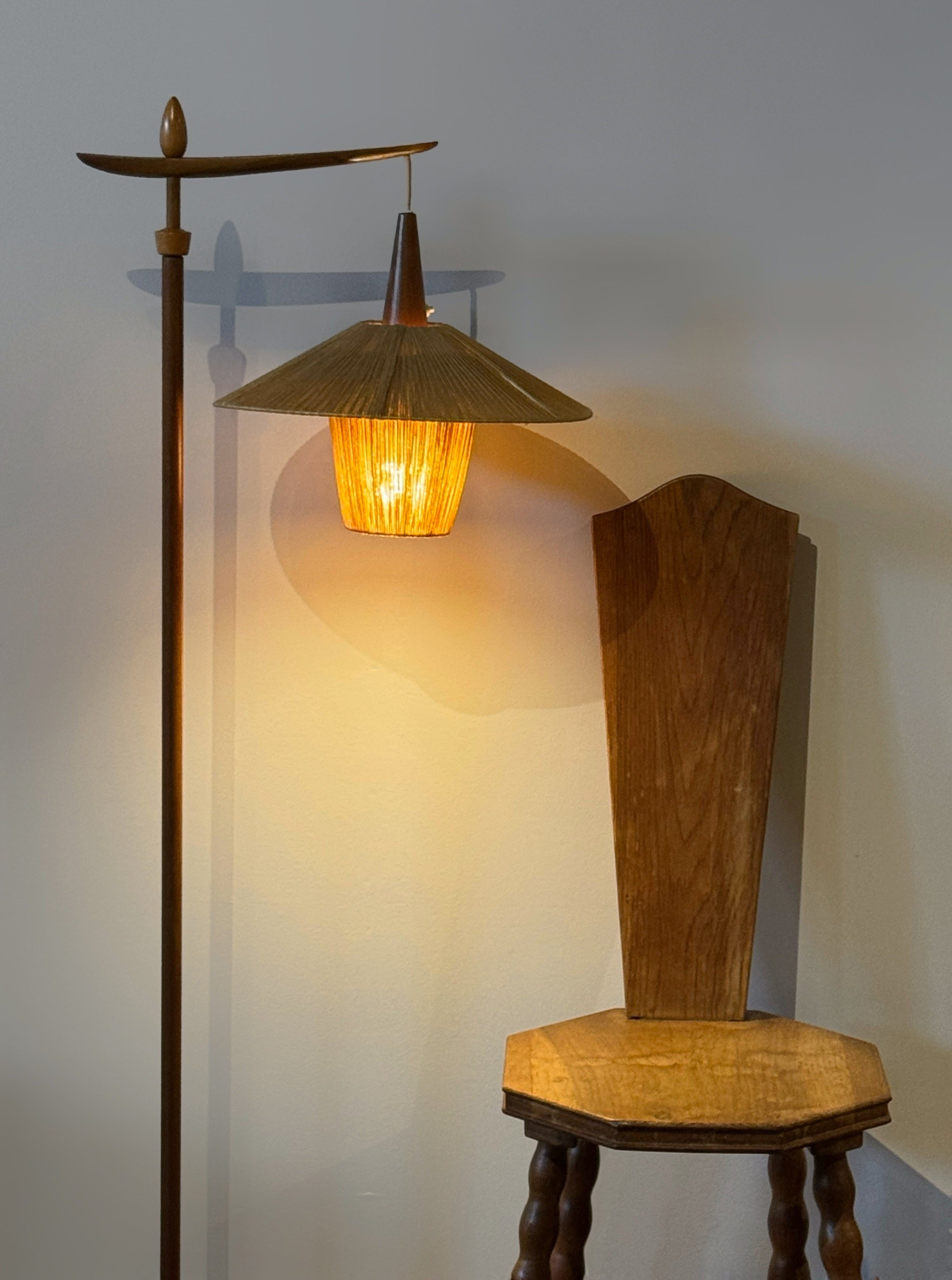 Floor lamp with cord shade manufactured by Temde Leuchten