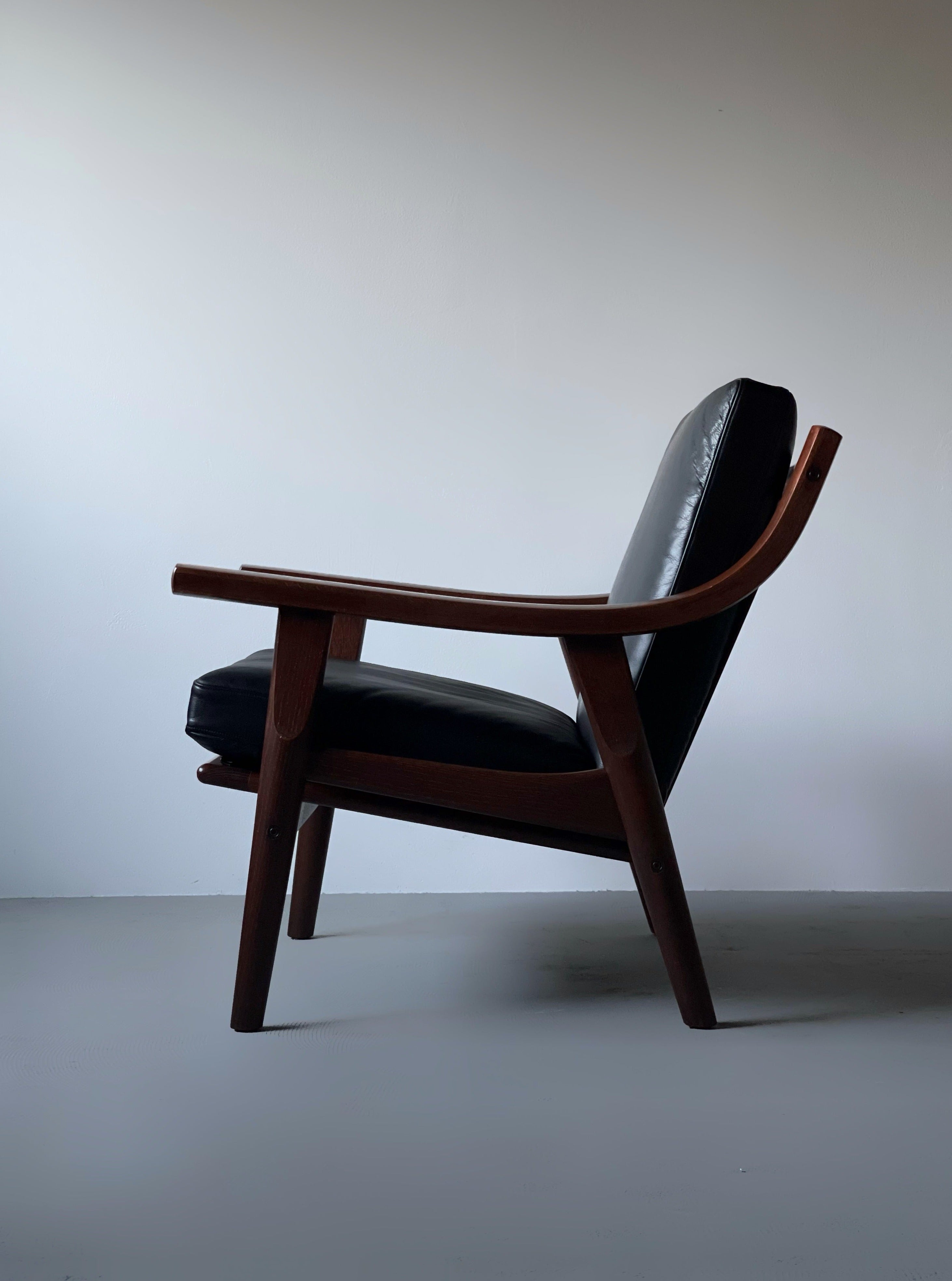 GE530 in dark stained oak by Hans J. Wegner