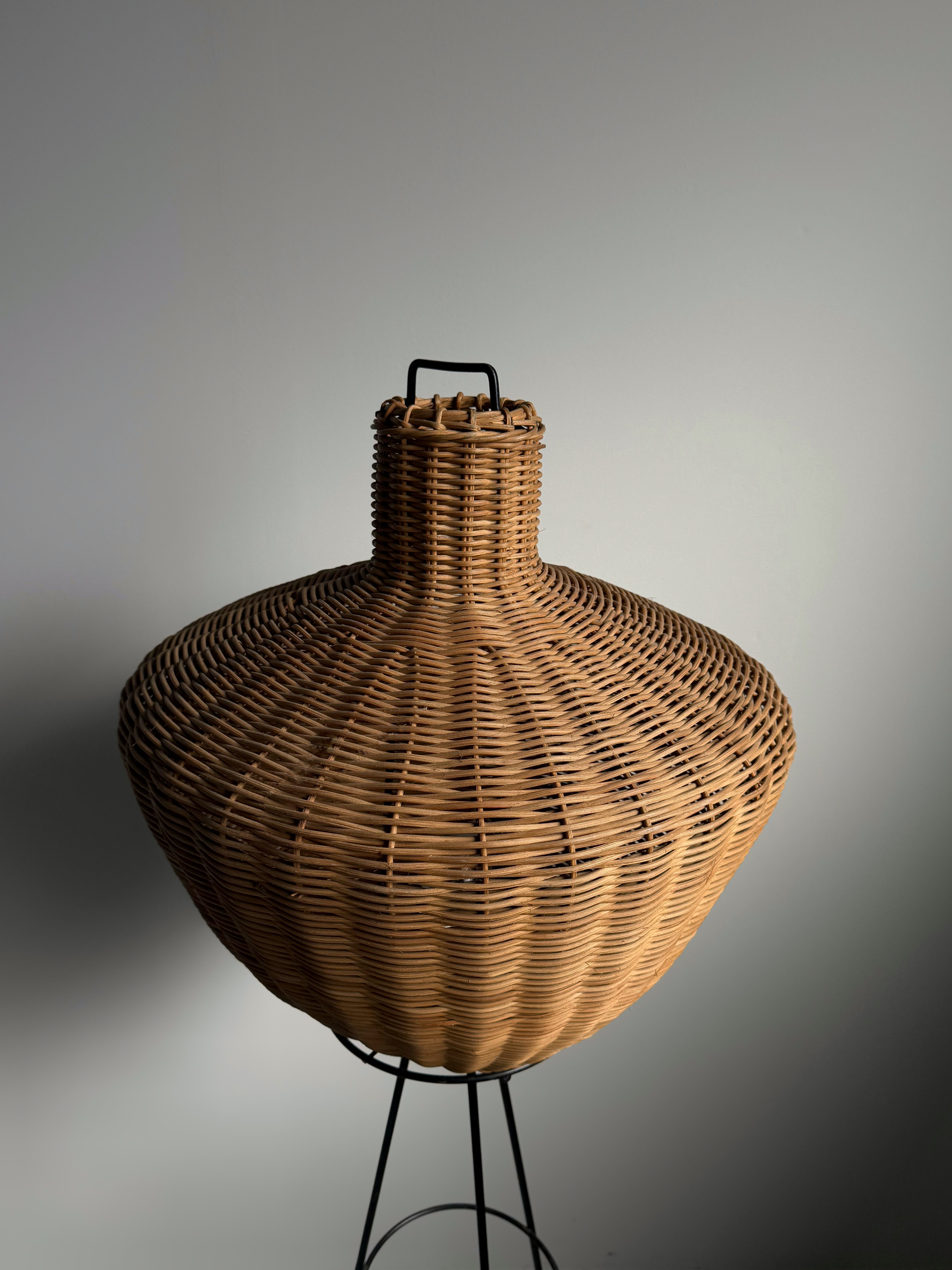 Tripod floor lamp in black metal and rattan 1950s