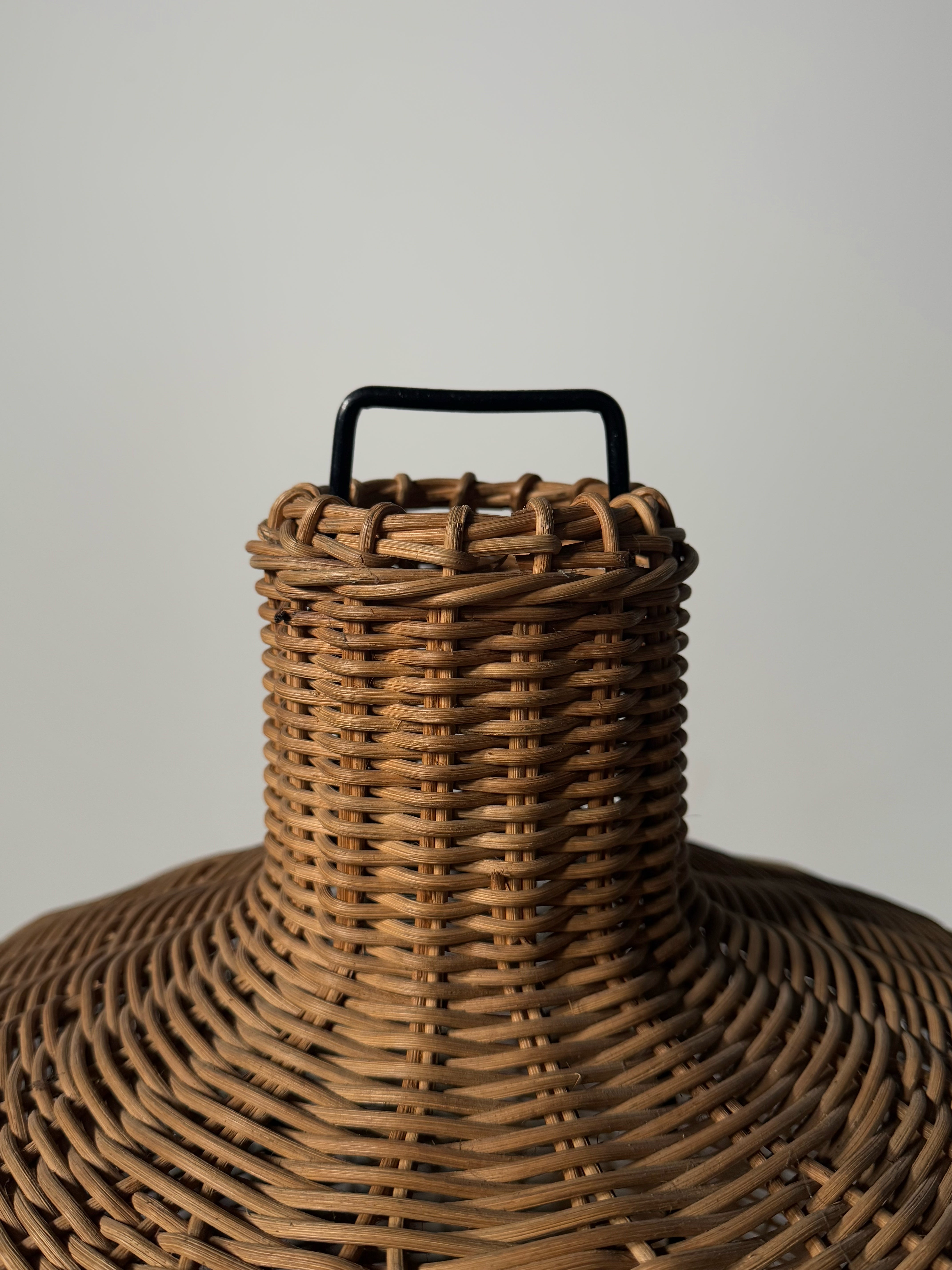 Tripod floor lamp in black metal and rattan 1950s