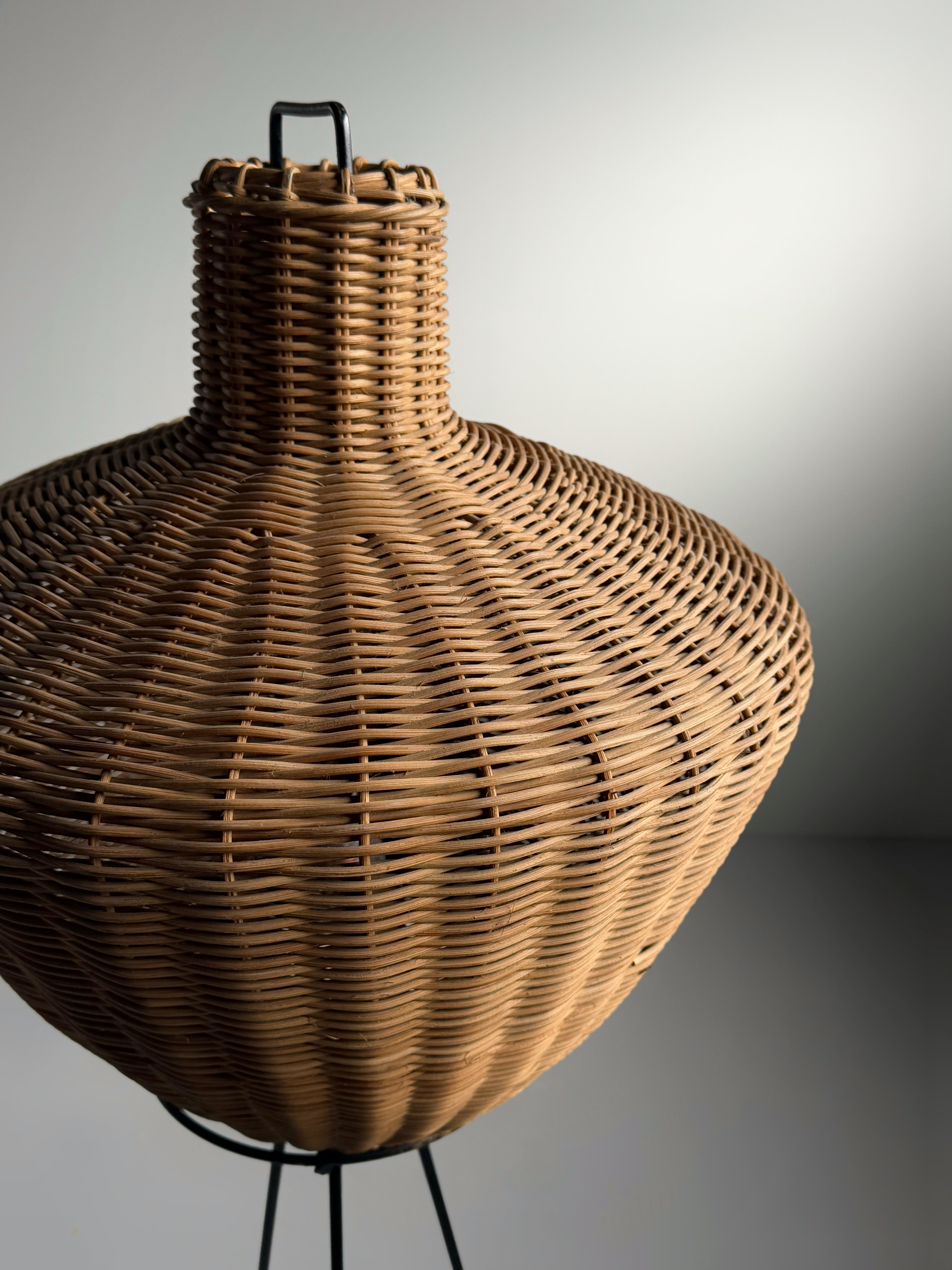 Tripod floor lamp in black metal and rattan 1950s