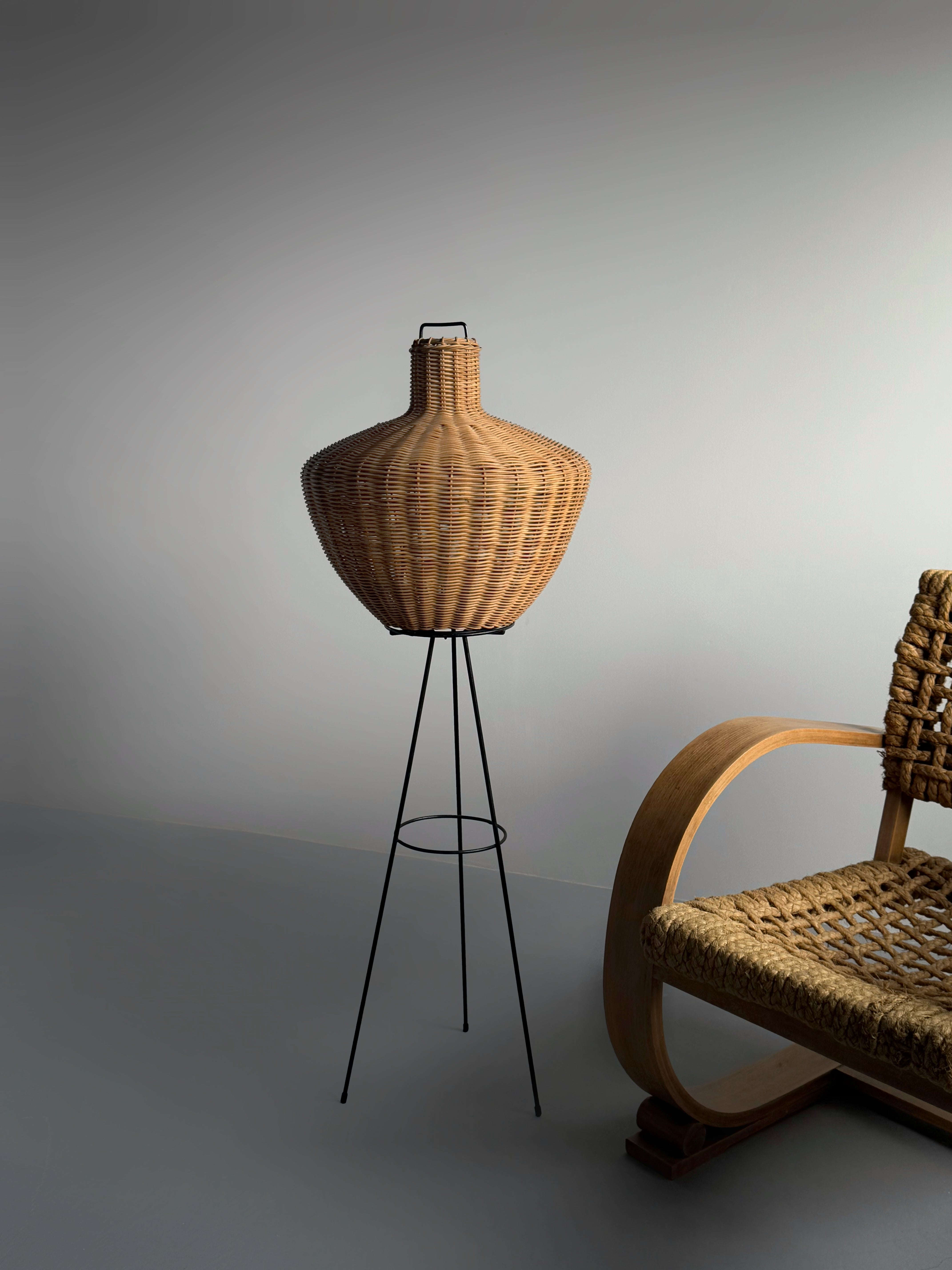 Tripod floor lamp in black metal and rattan 1950s