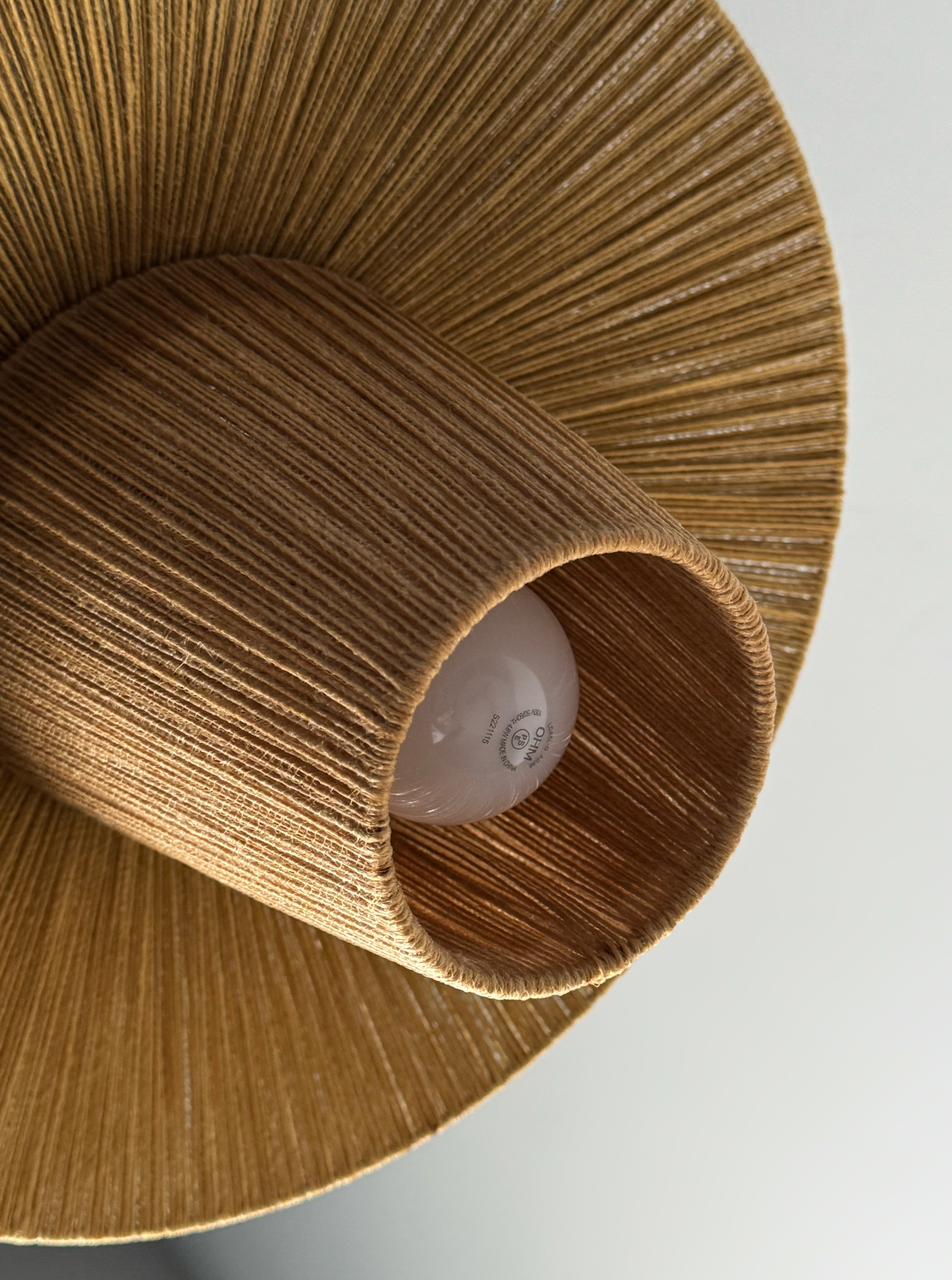 Floor lamp with cord shade manufactured by Temde Leuchten