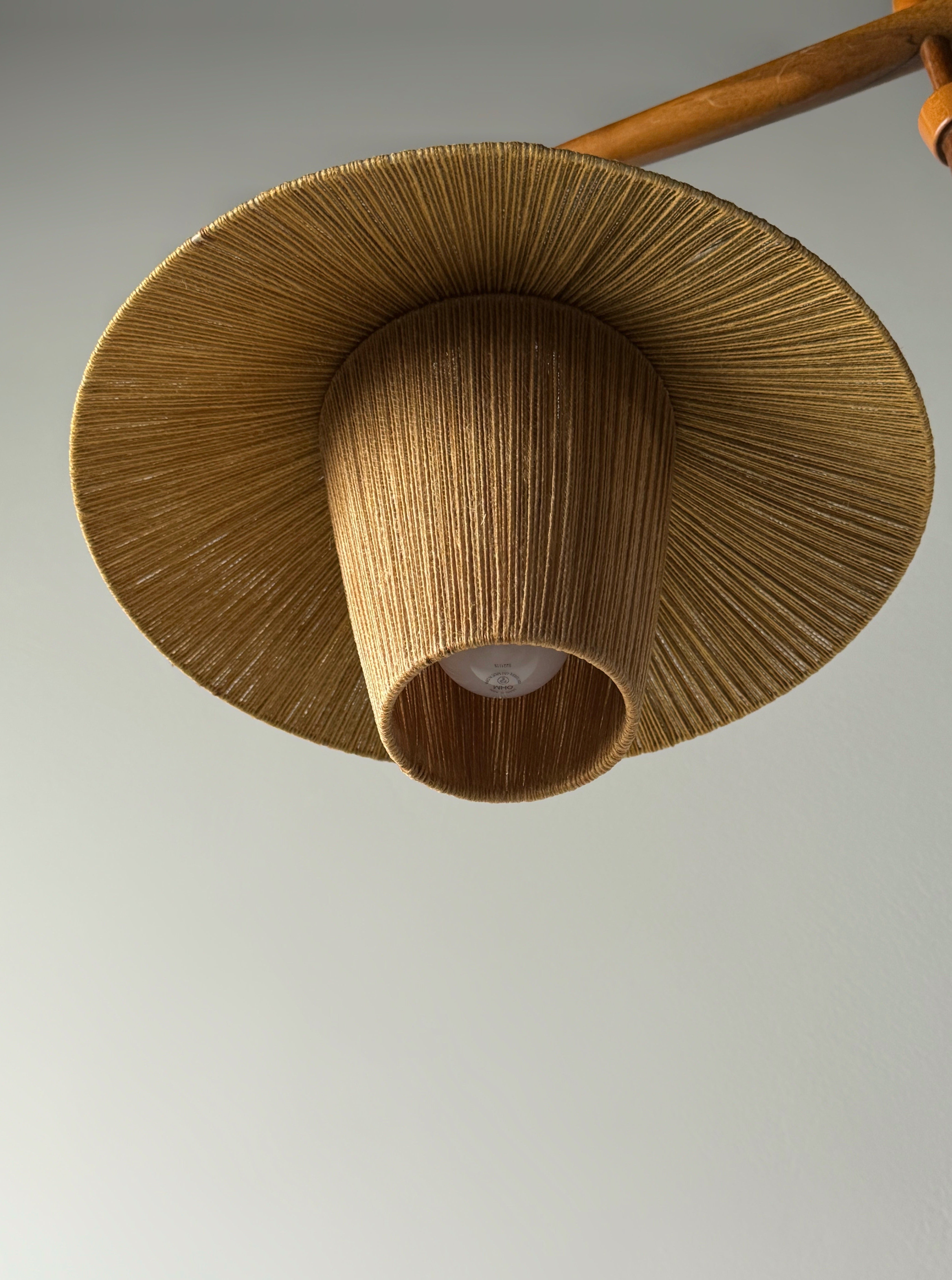 Floor lamp with cord shade manufactured by Temde Leuchten