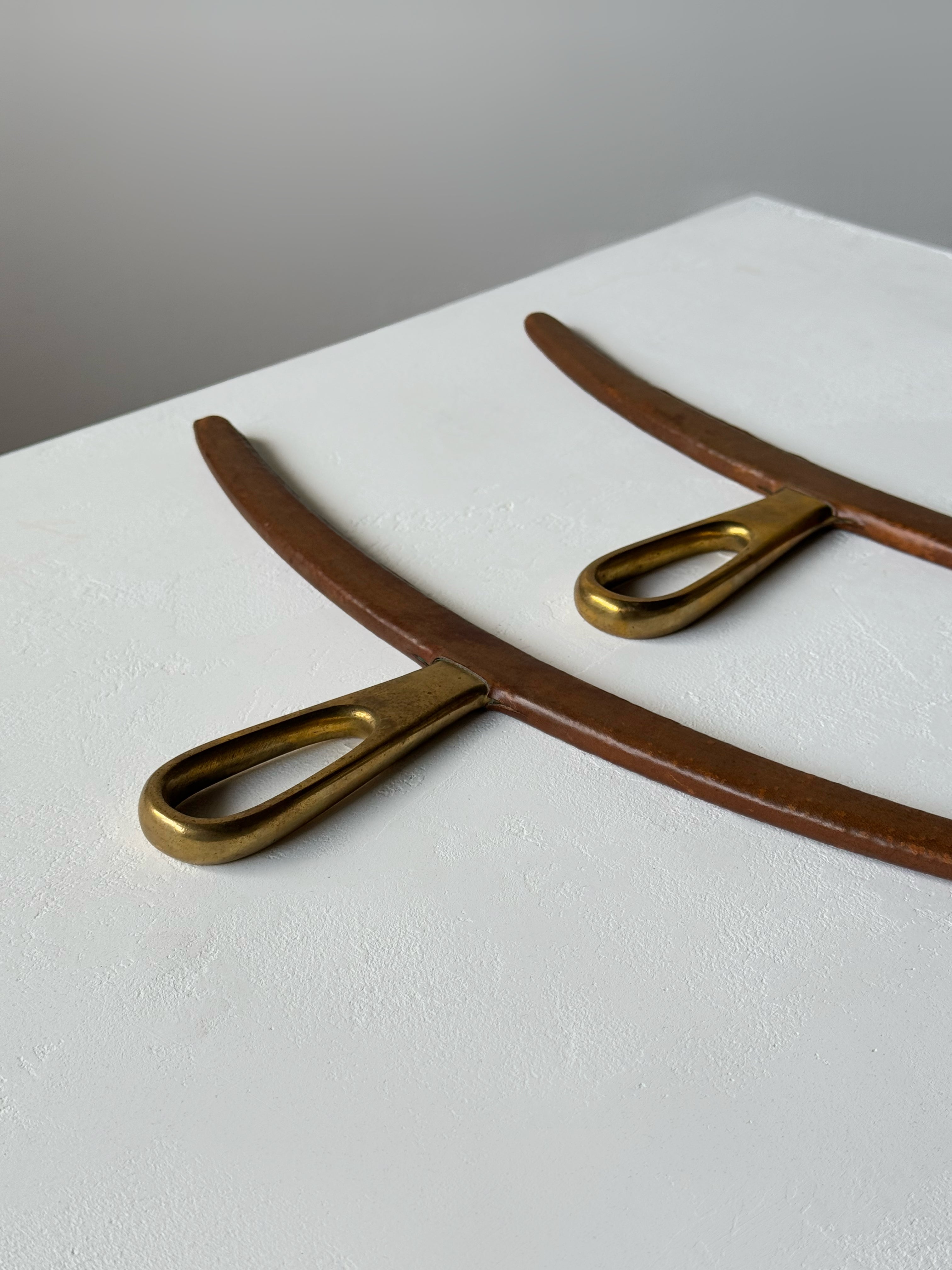 Brass and Leather Cloth Hangers by Carl Auböck