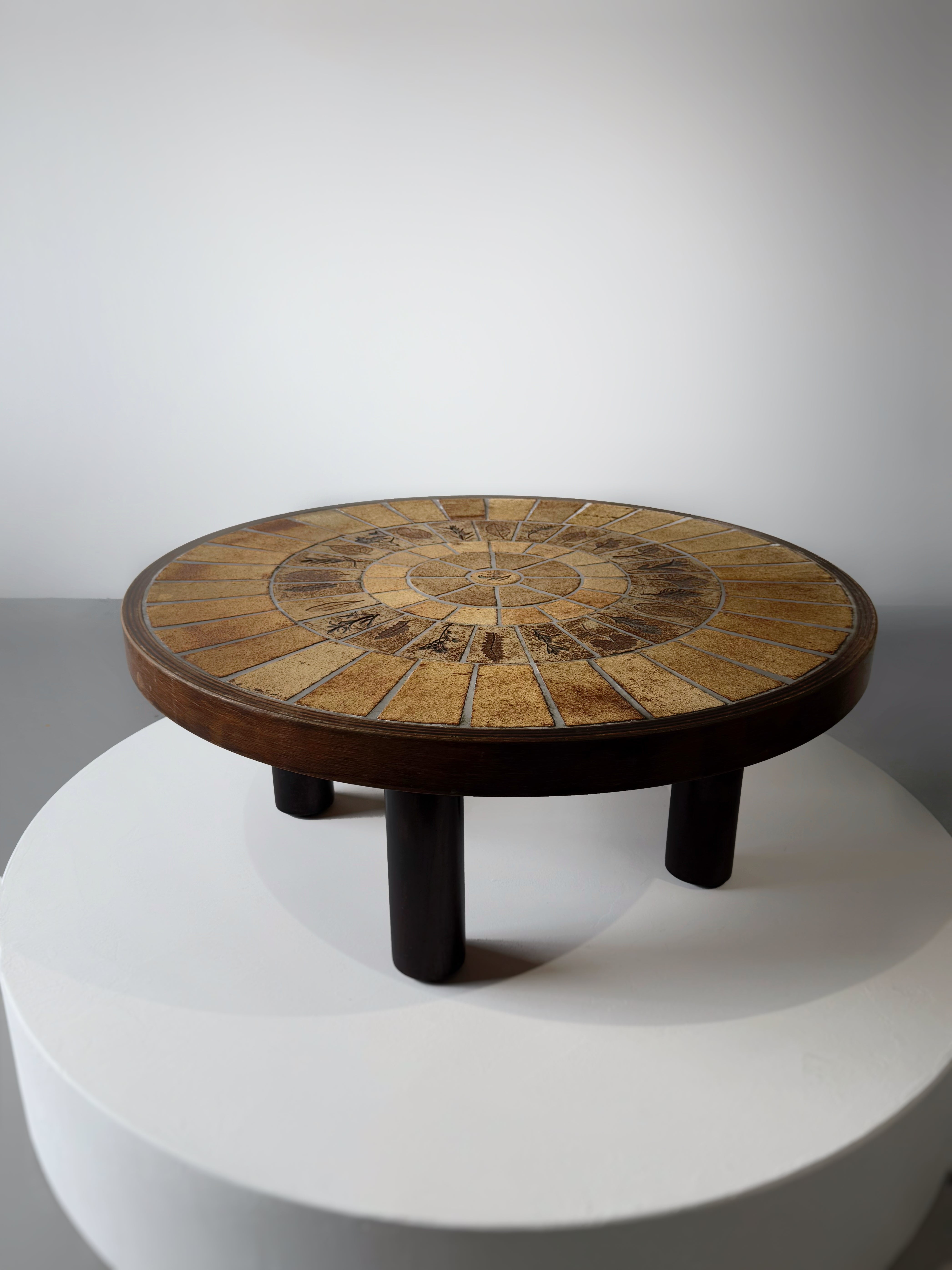Low round coffee table by Roger Capron