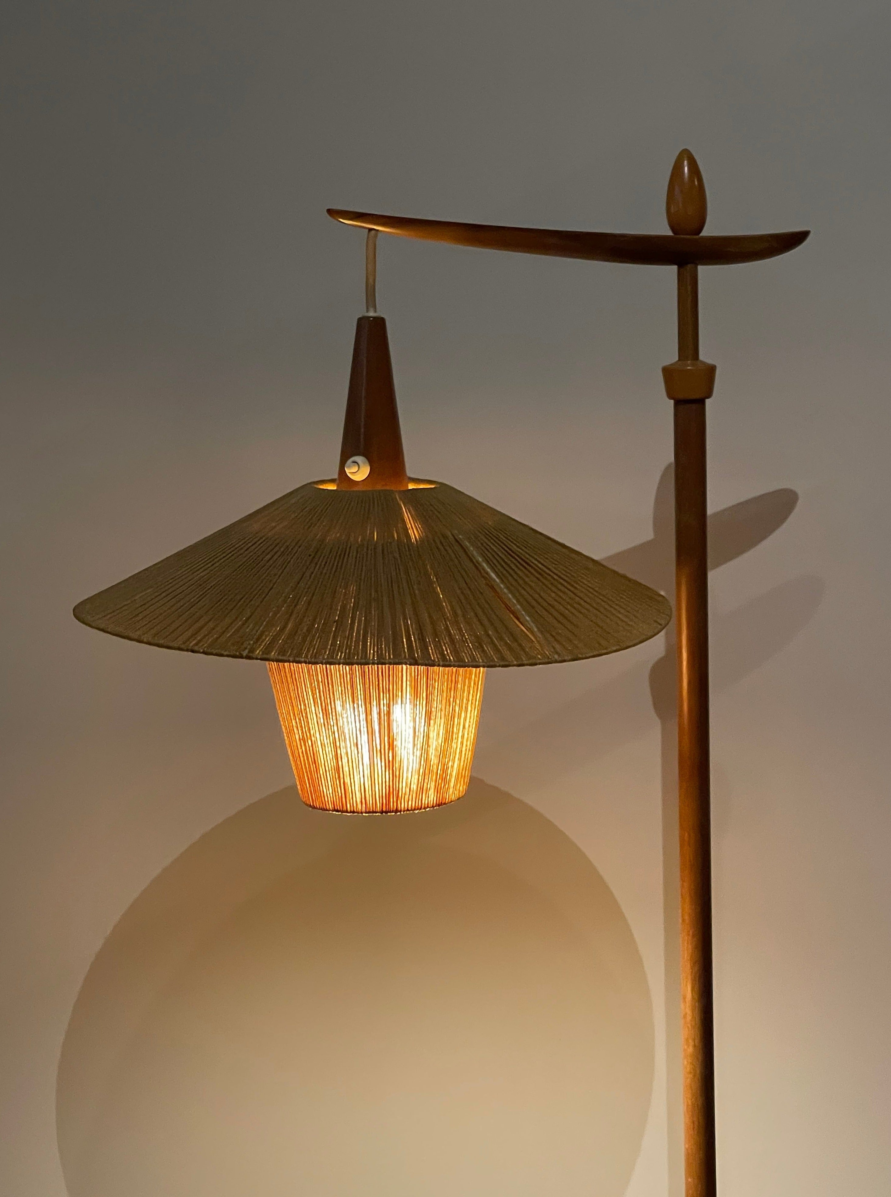 Floor lamp with cord shade manufactured by Temde Leuchten