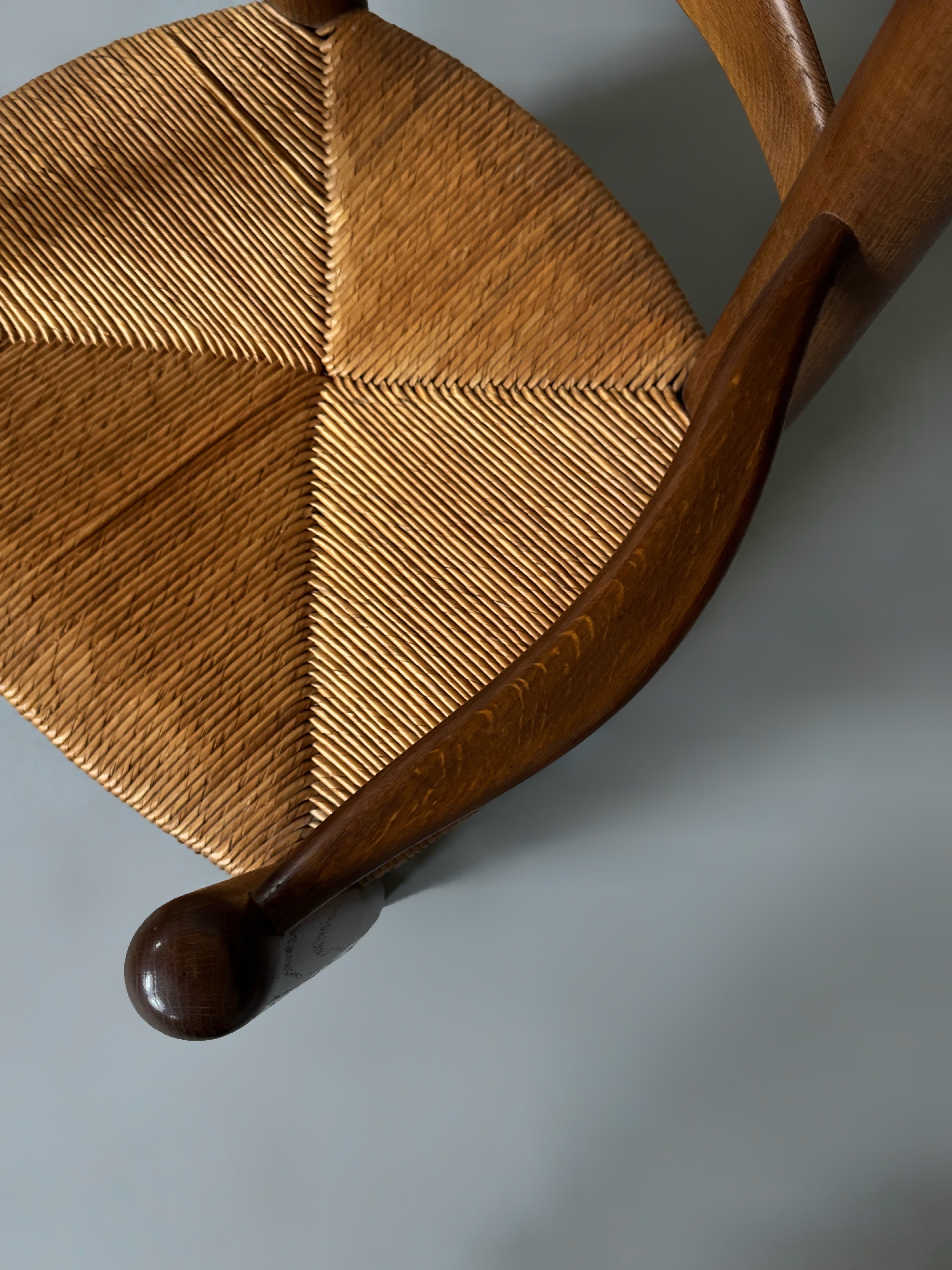 Pair of oak and cane armchairs, France 1950s