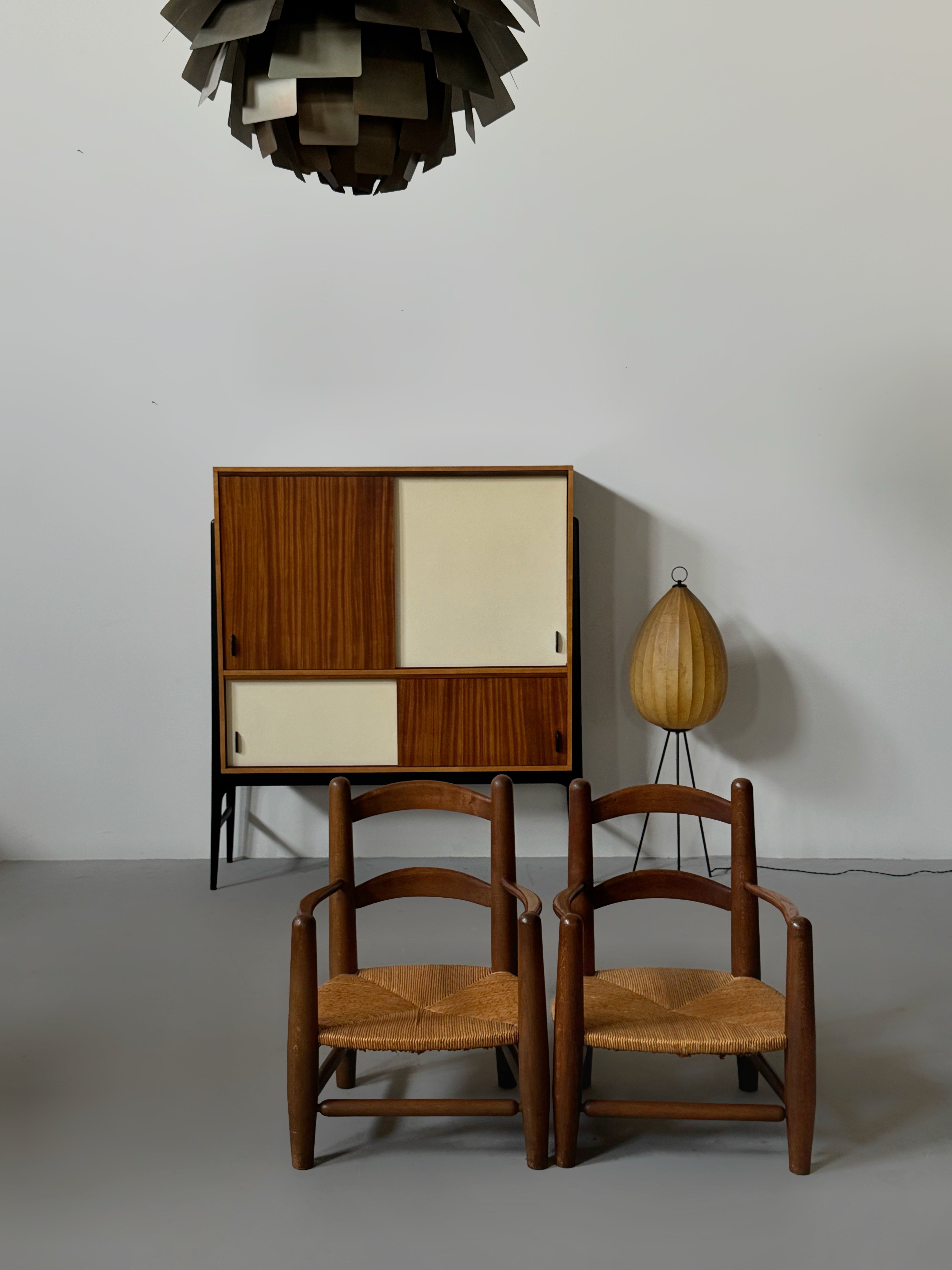 Pair of oak and cane armchairs, France 1950s