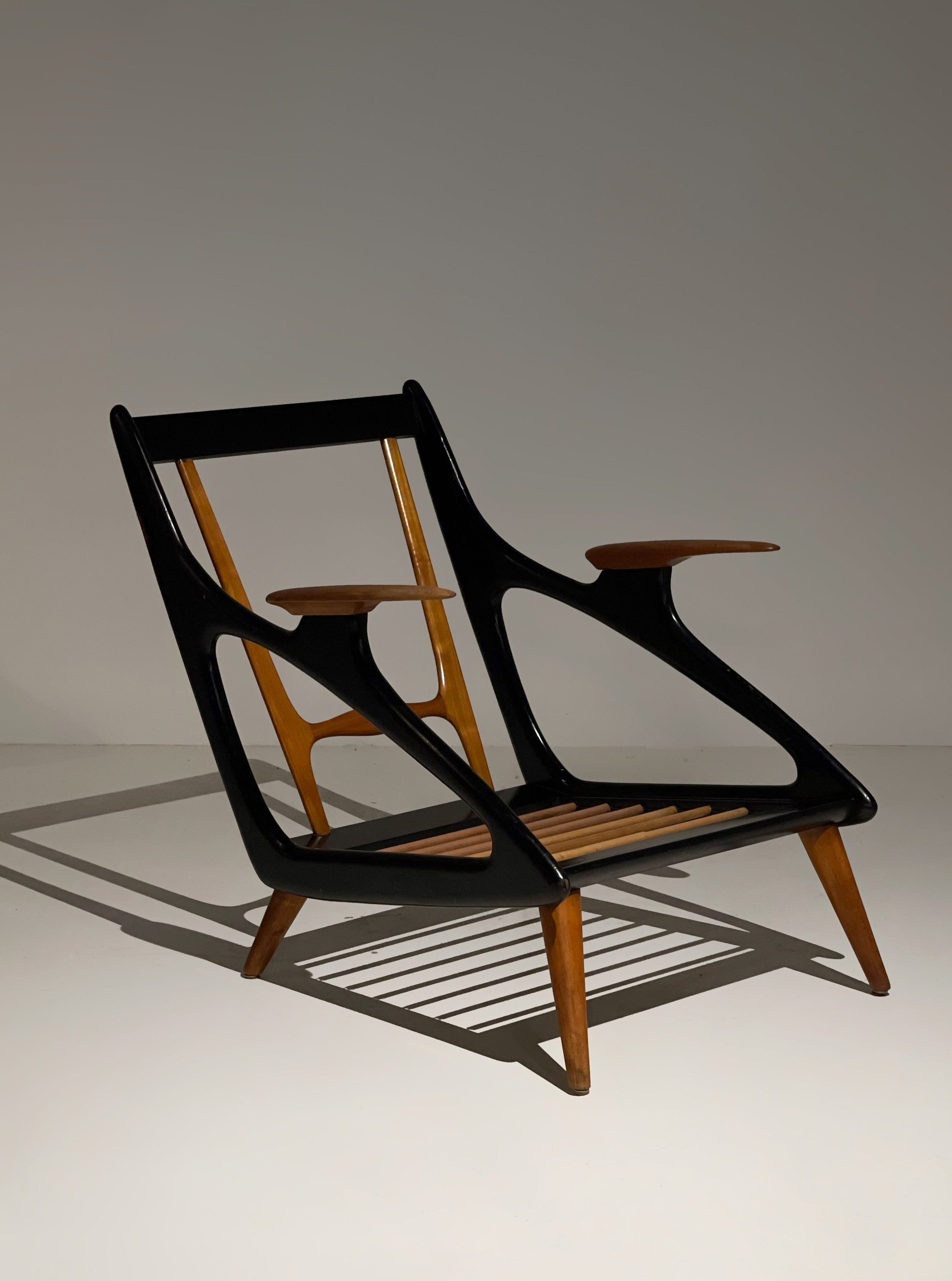 Atomic carved lounge chair