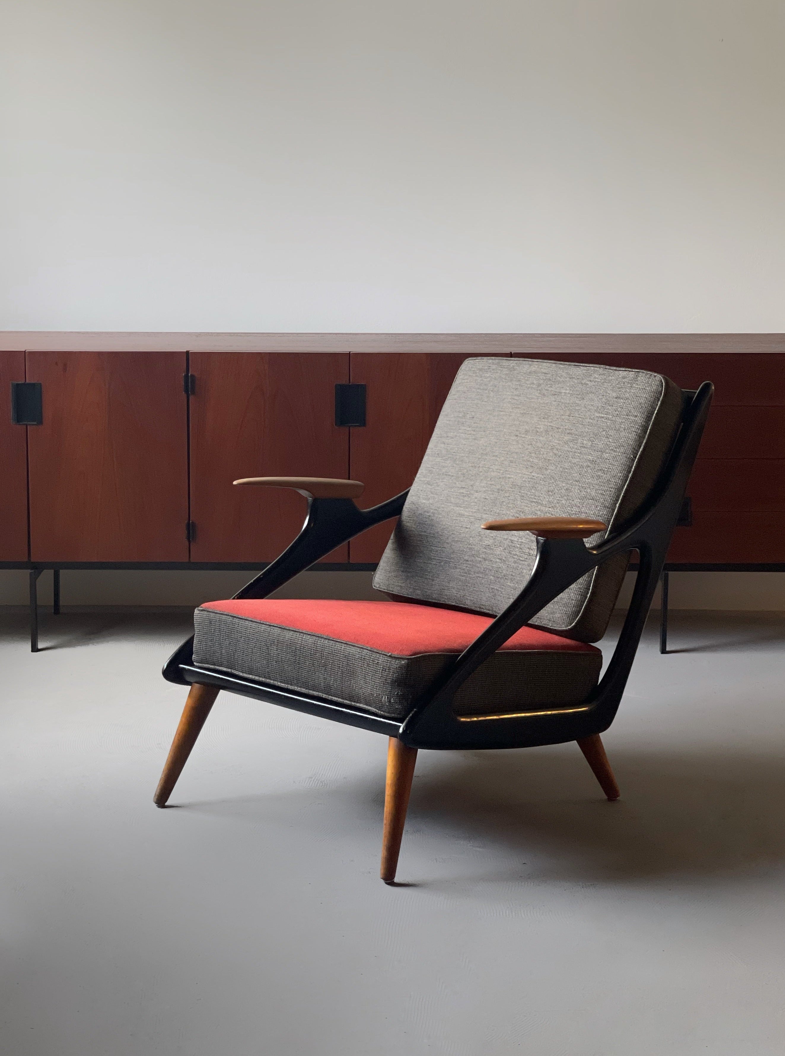 Atomic carved lounge chair