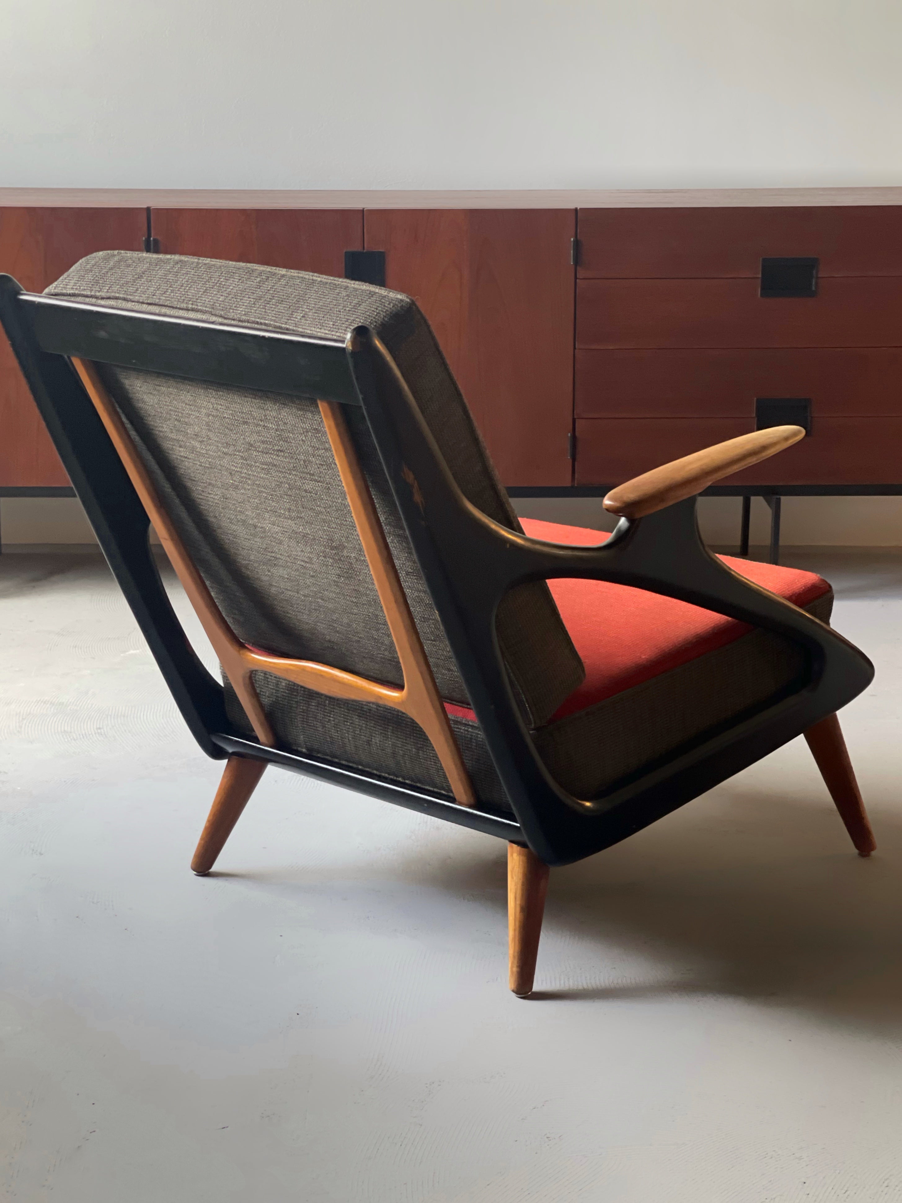 Atomic carved lounge chair