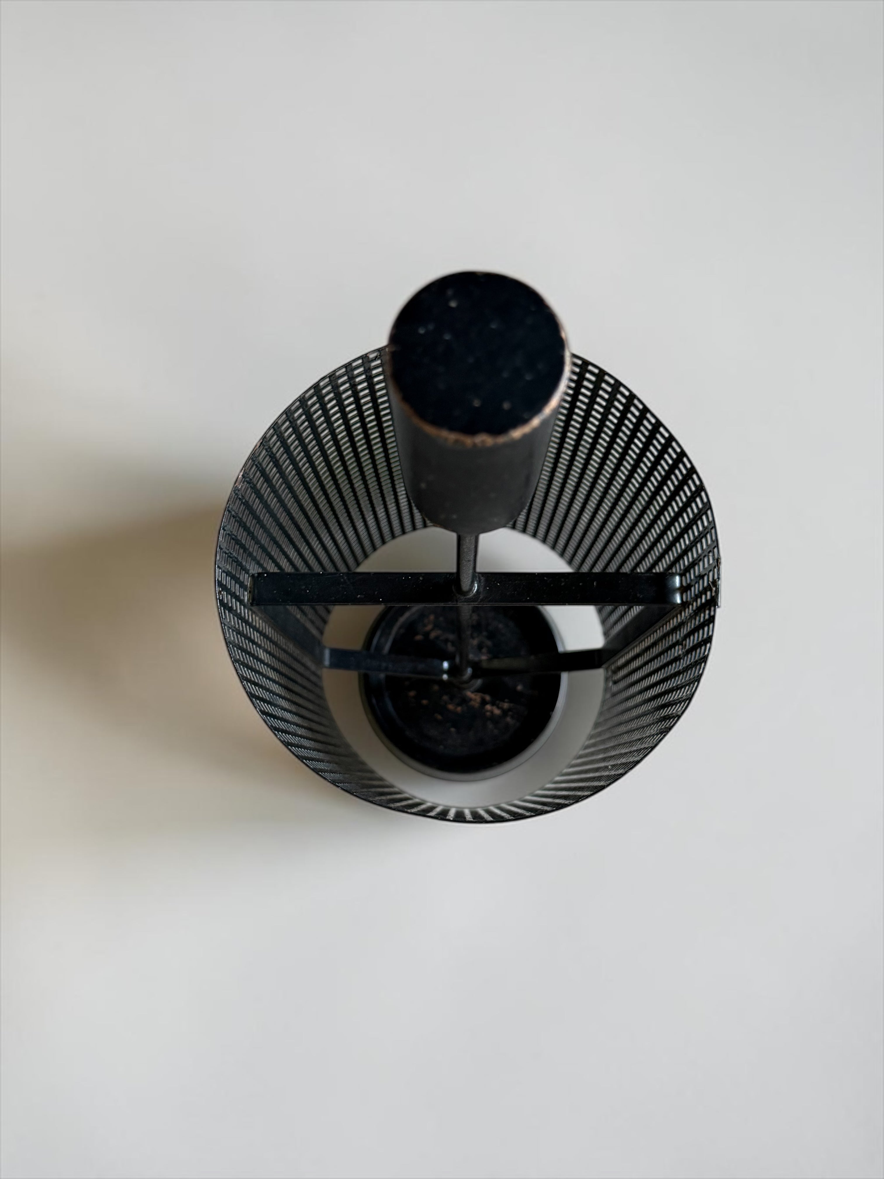 Minimalistic dutch design perforated metal umbrella stand