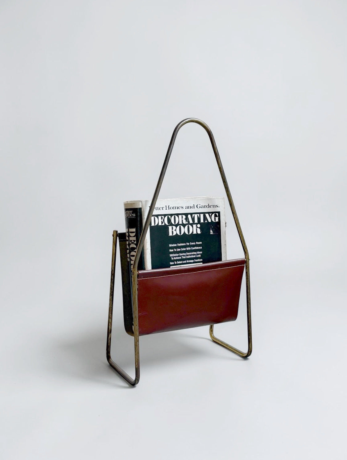 Magazine holder in brass and leather by CARL AUBÖCK (1900-1957) Austria 1950s　