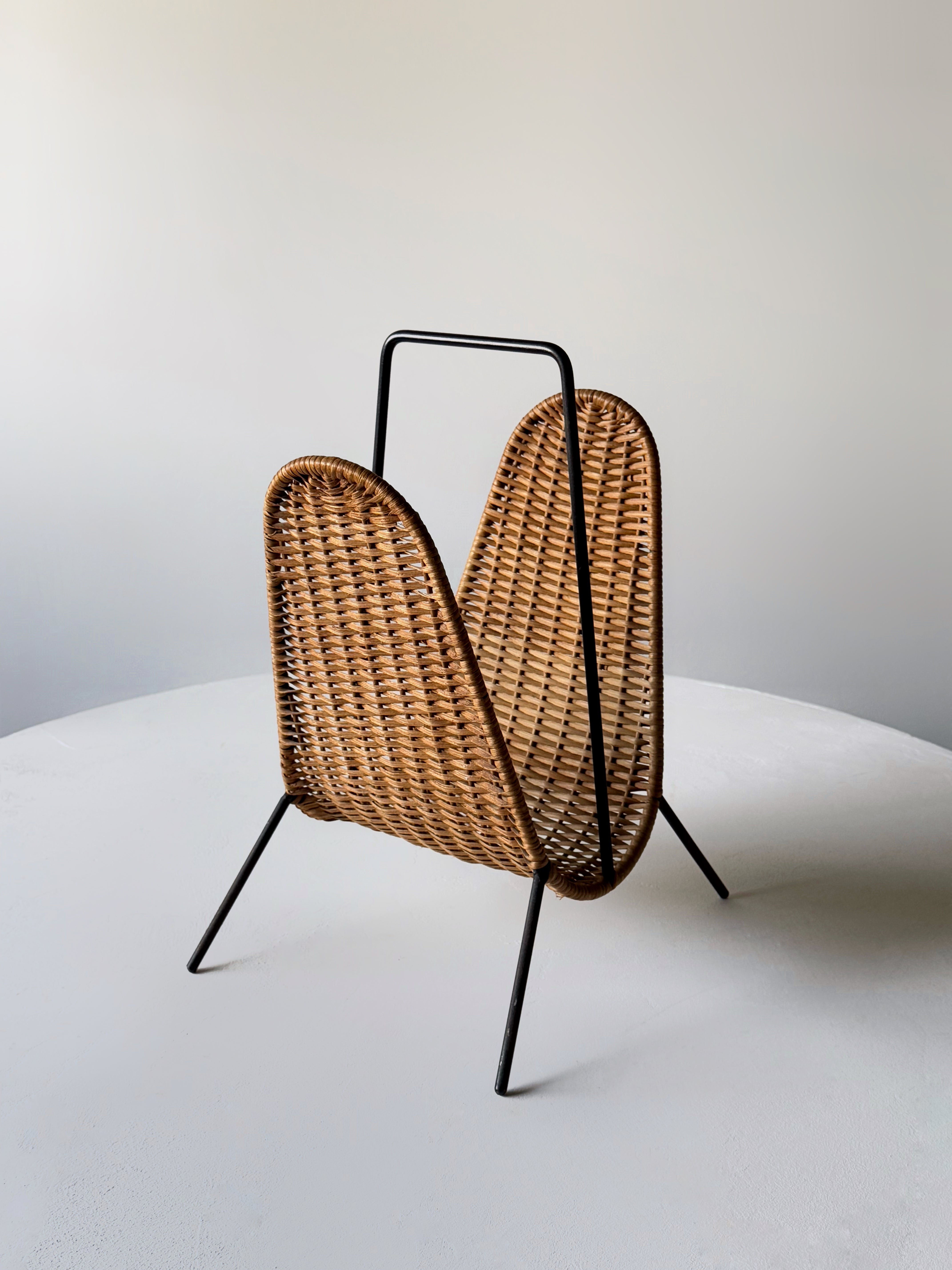 Wicker and metal magazine rack