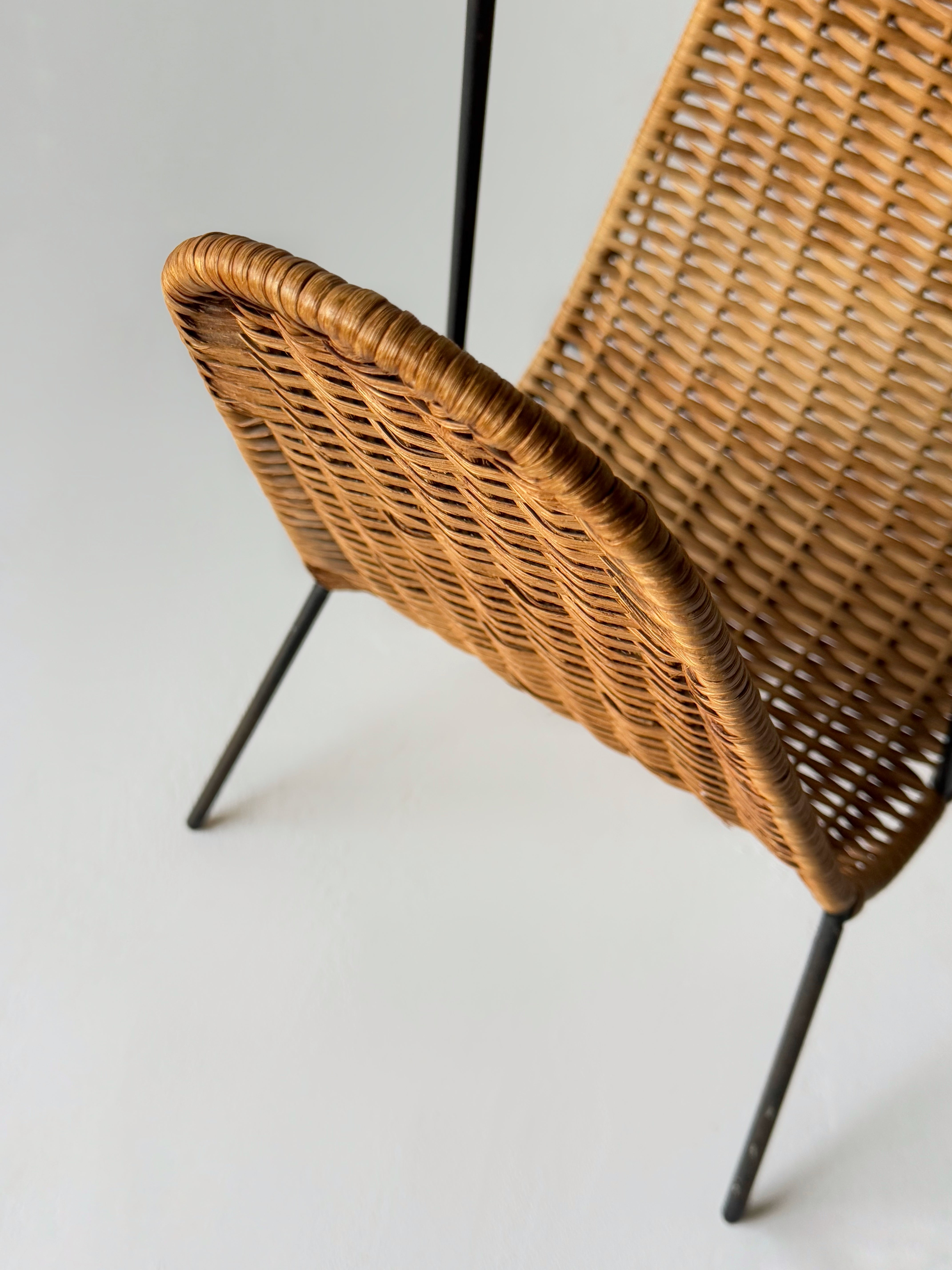 Wicker and metal magazine rack