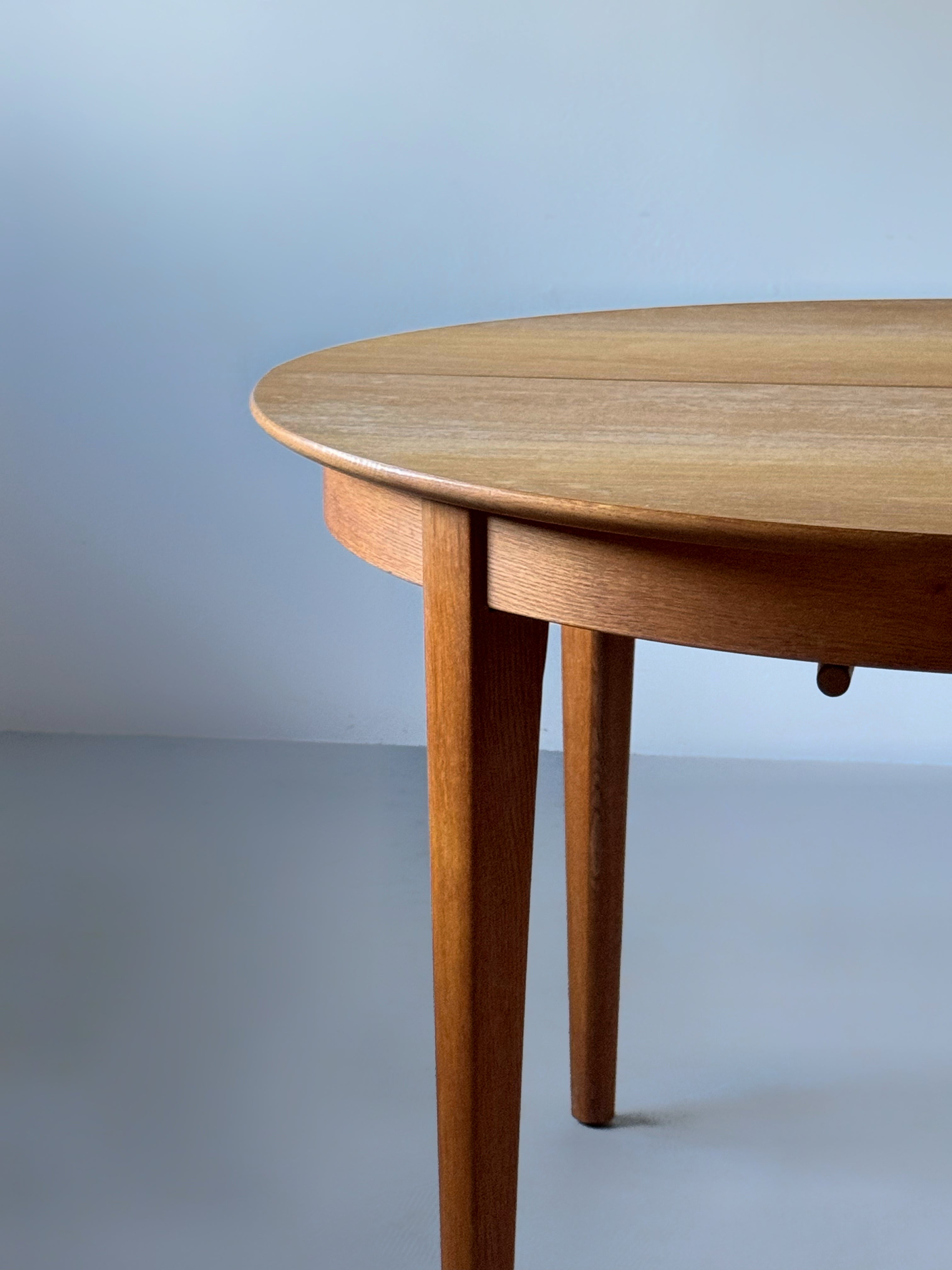 Oak Extendable Dining Table with 3 Inner Leaves by Henning Kjærnulf