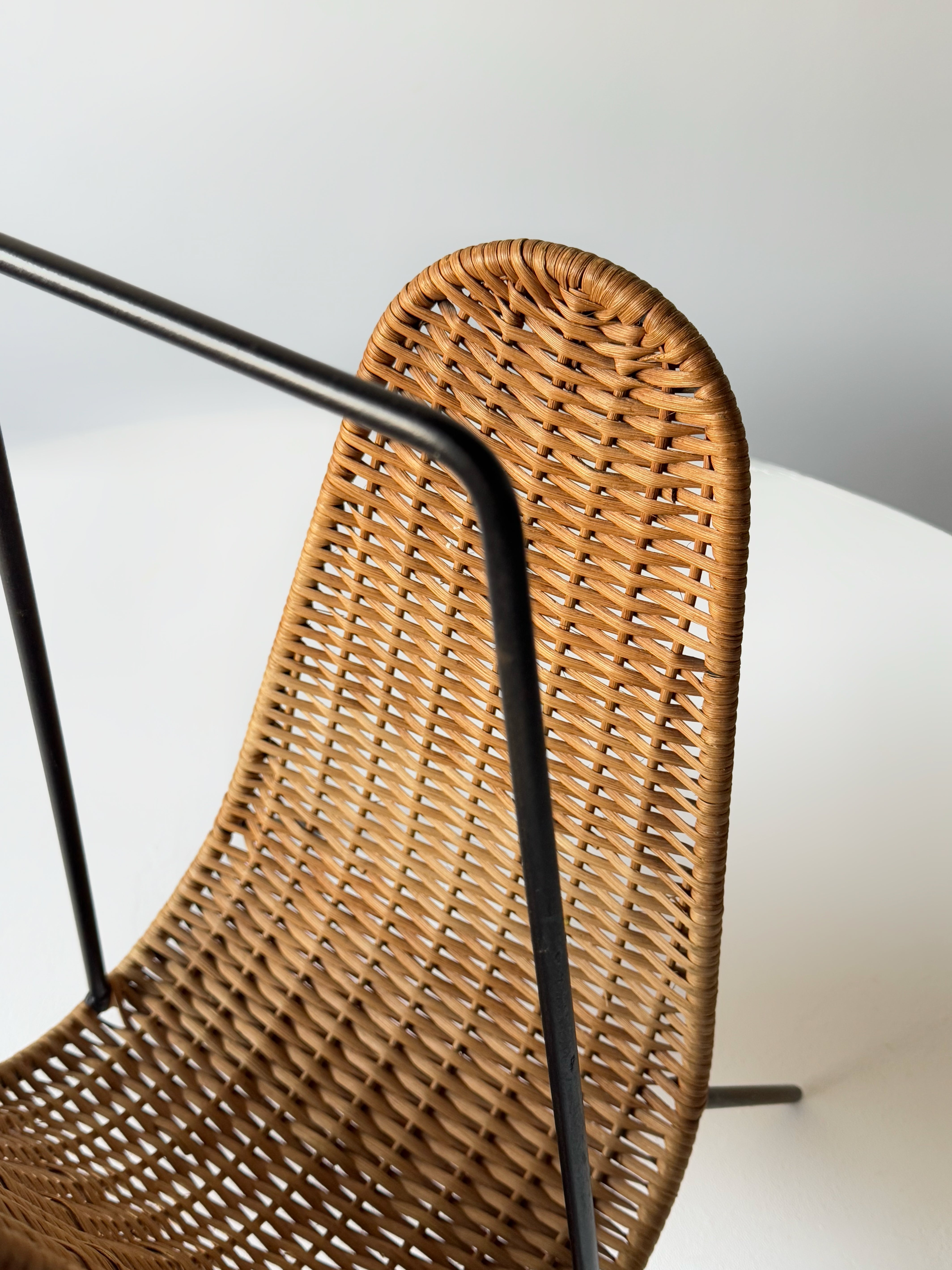 Wicker and metal magazine rack