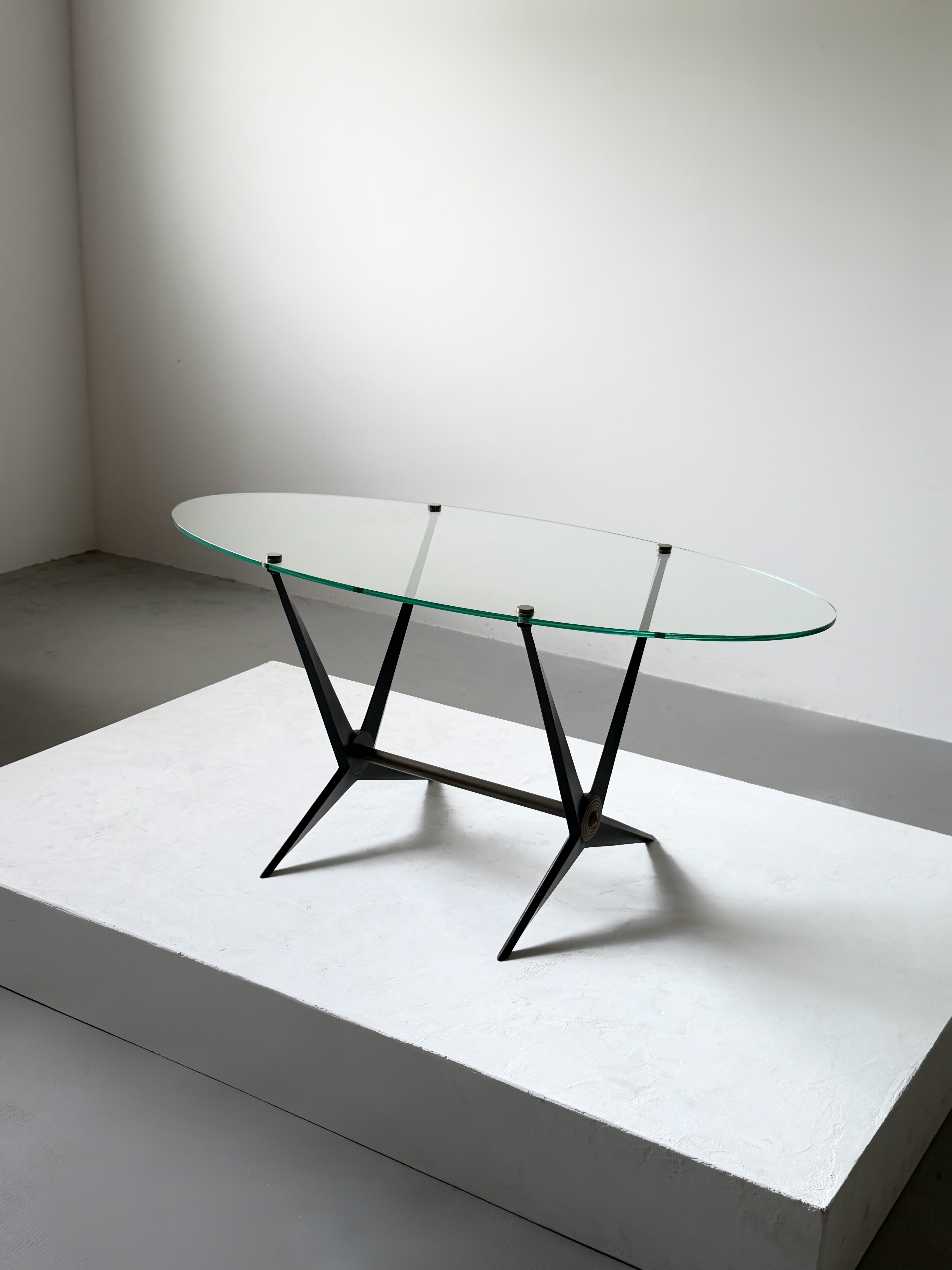 Oval coffee table by Angelo Ostuni in metal and glass, Italy 1950