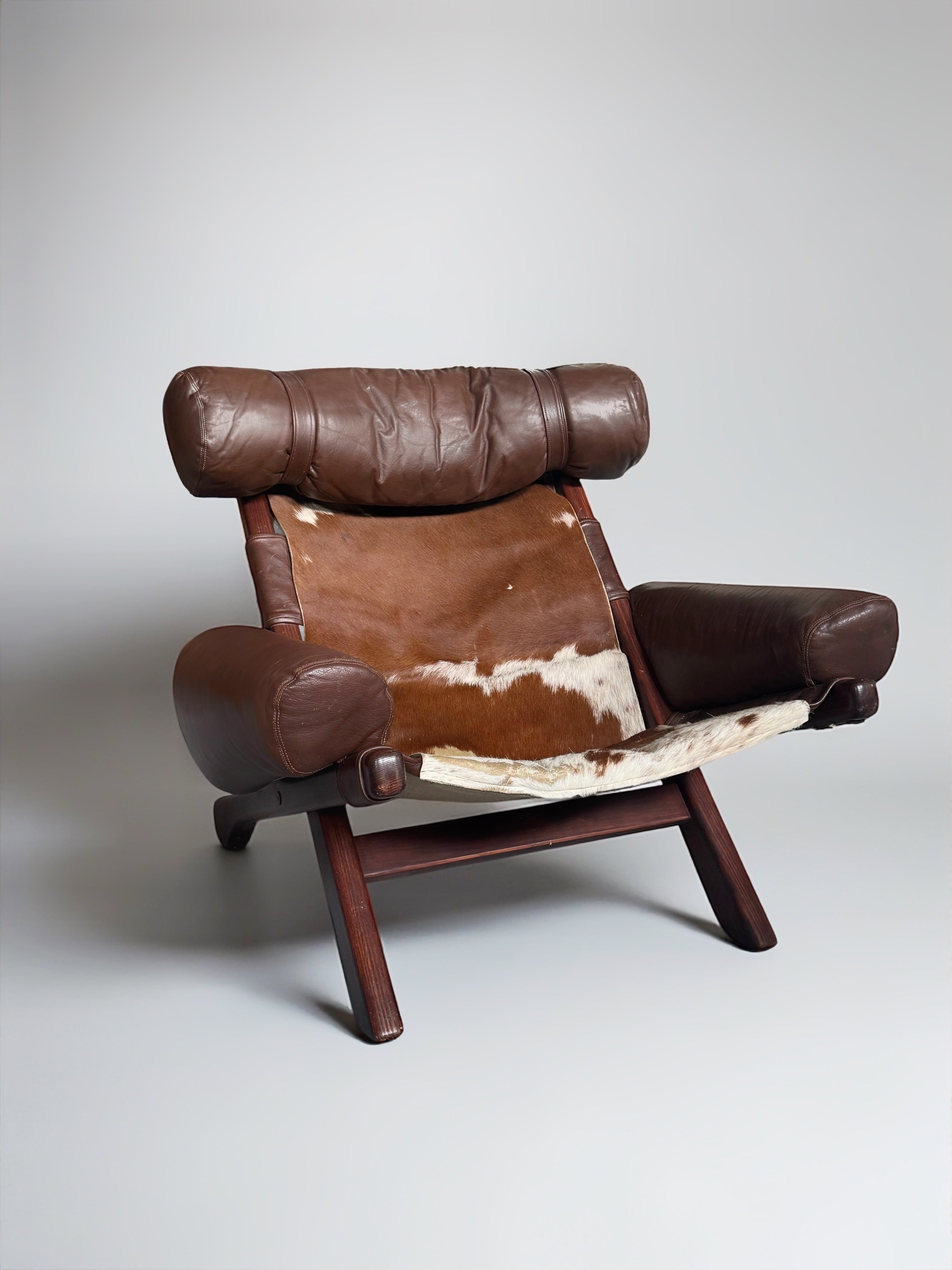 Swedish Cow Hide Armchair from Arne Norell AB, 1960