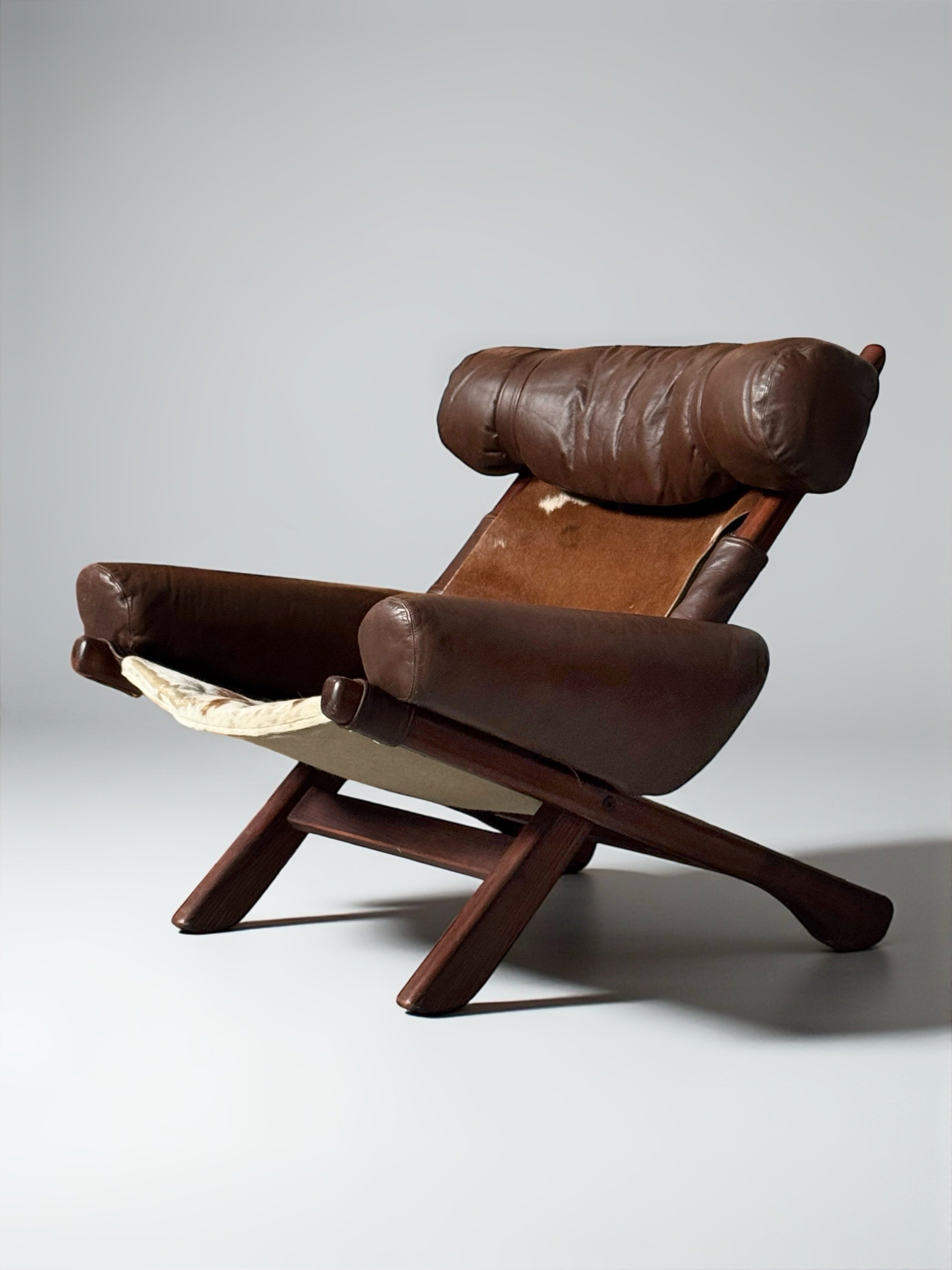 Swedish Cow Hide Armchair from Arne Norell AB, 1960