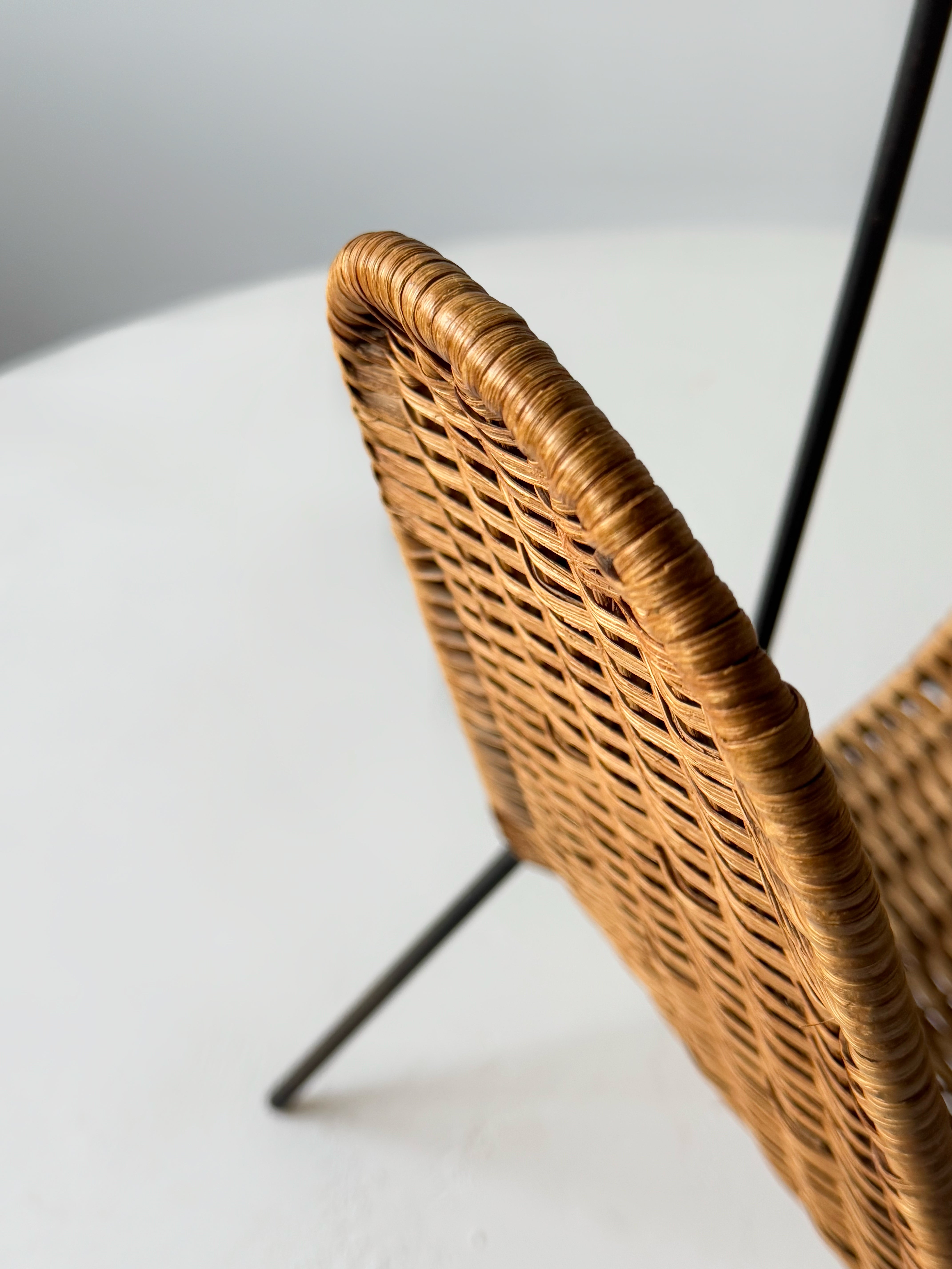 Wicker and metal magazine rack