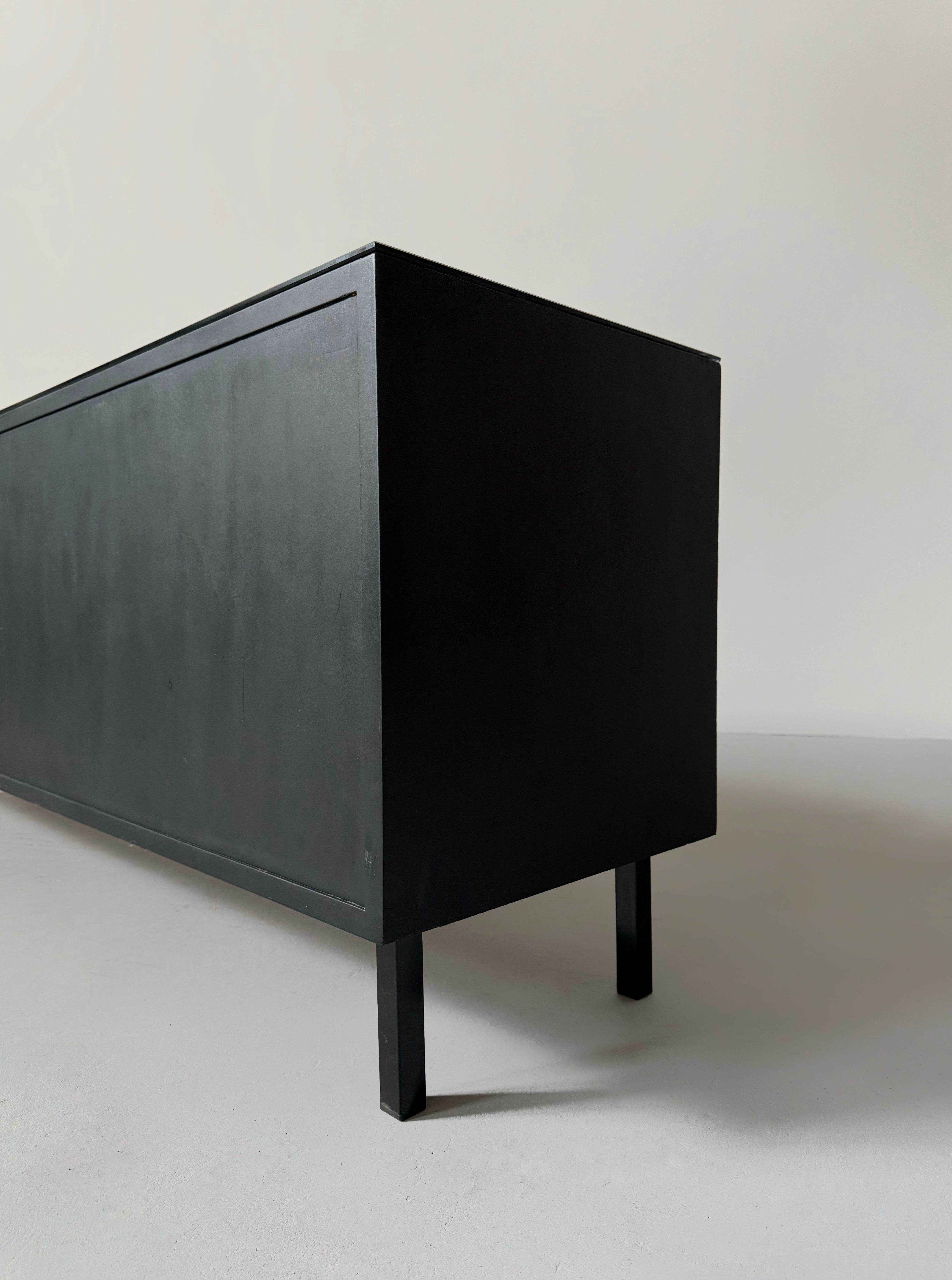Mid-century French sideboard in teak and black glass top
