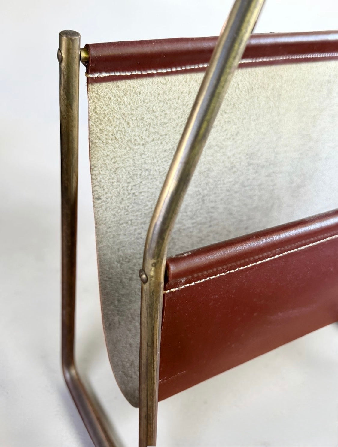 Magazine holder in brass and leather by CARL AUBÖCK (1900-1957) Austria 1950s　