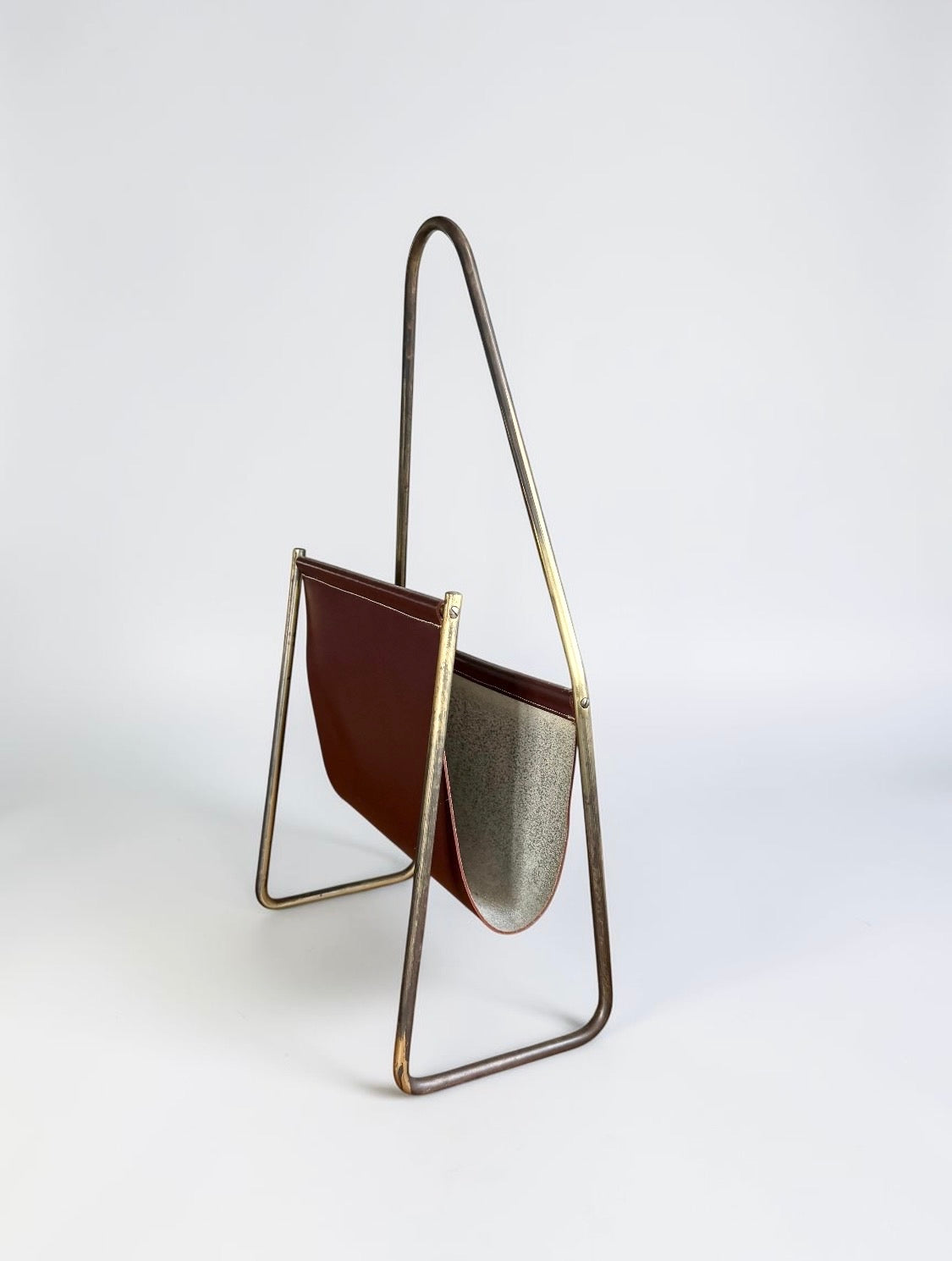 Magazine holder in brass and leather by CARL AUBÖCK (1900-1957) Austria 1950s　
