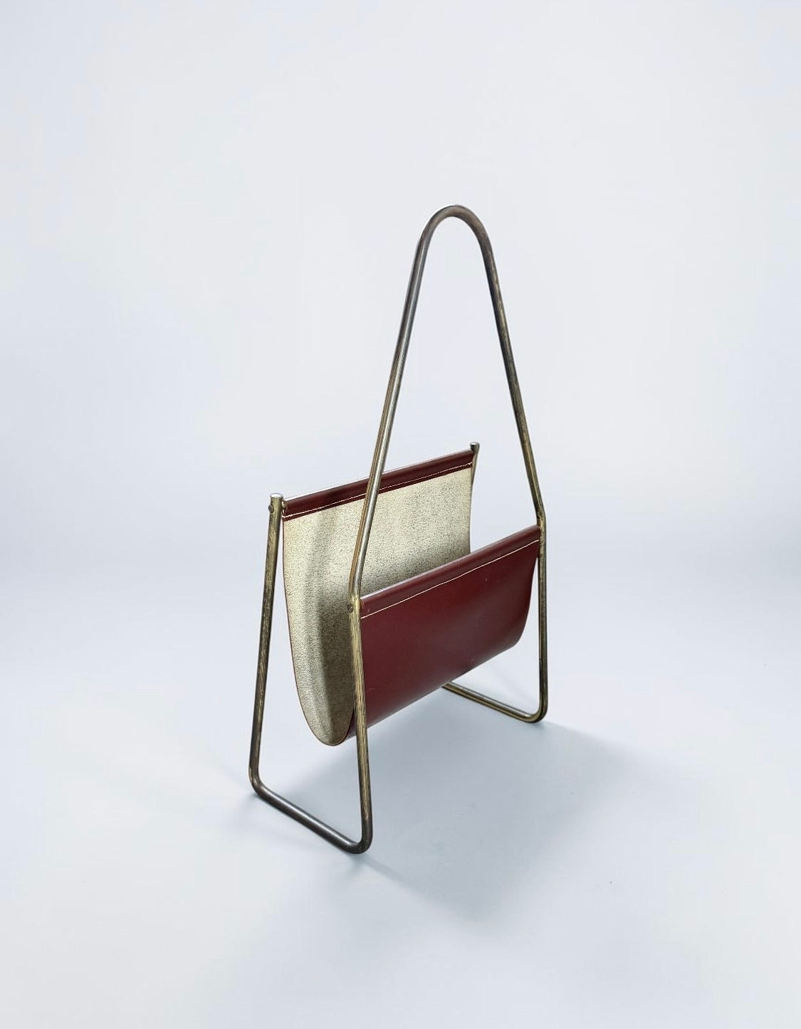 Magazine holder in brass and leather by CARL AUBÖCK (1900-1957) Austria 1950s　