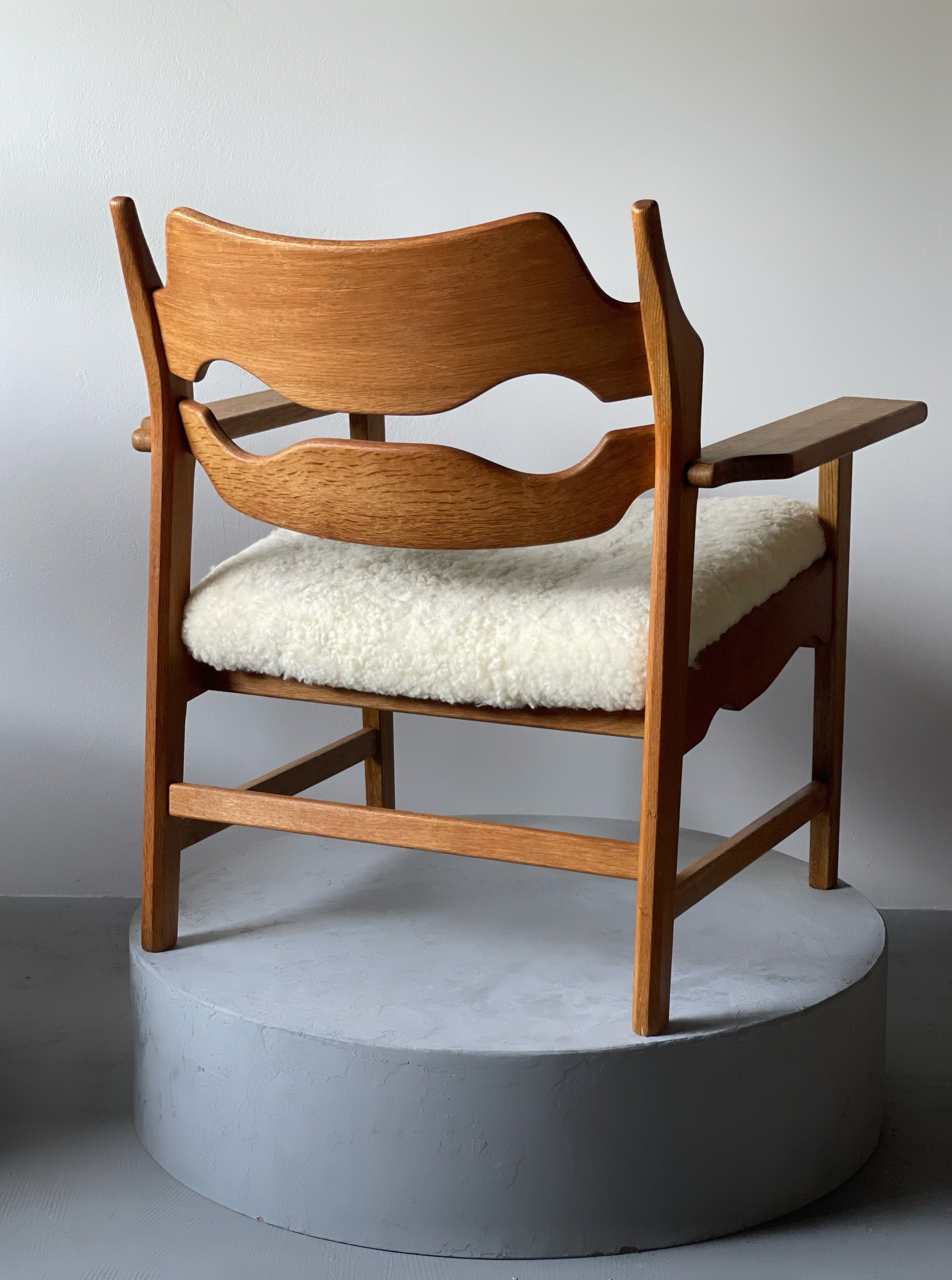 Razor Blade armchair in oak by Henry Kjærnulf