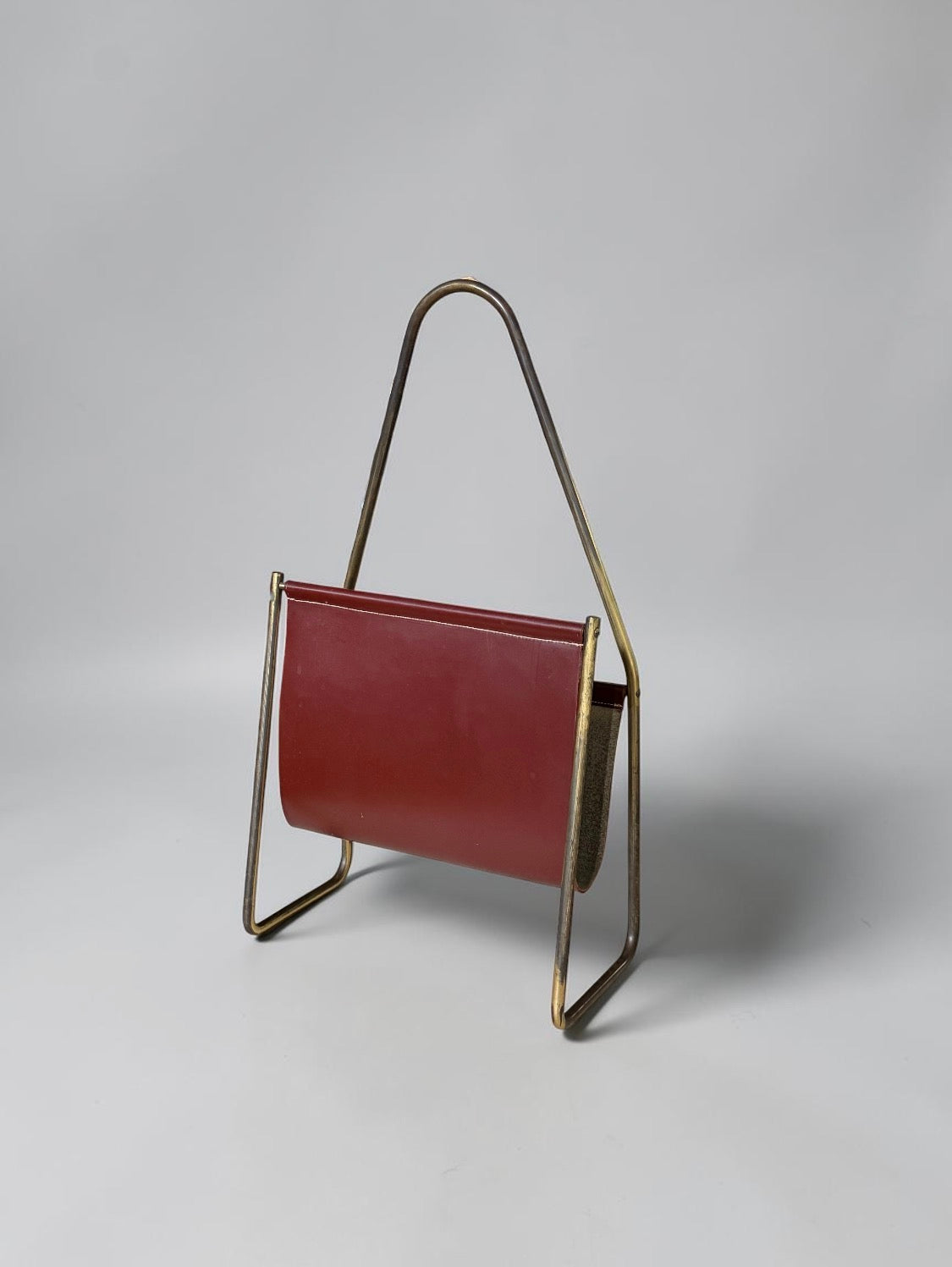 Magazine holder in brass and leather by CARL AUBÖCK (1900-1957) Austria 1950s　