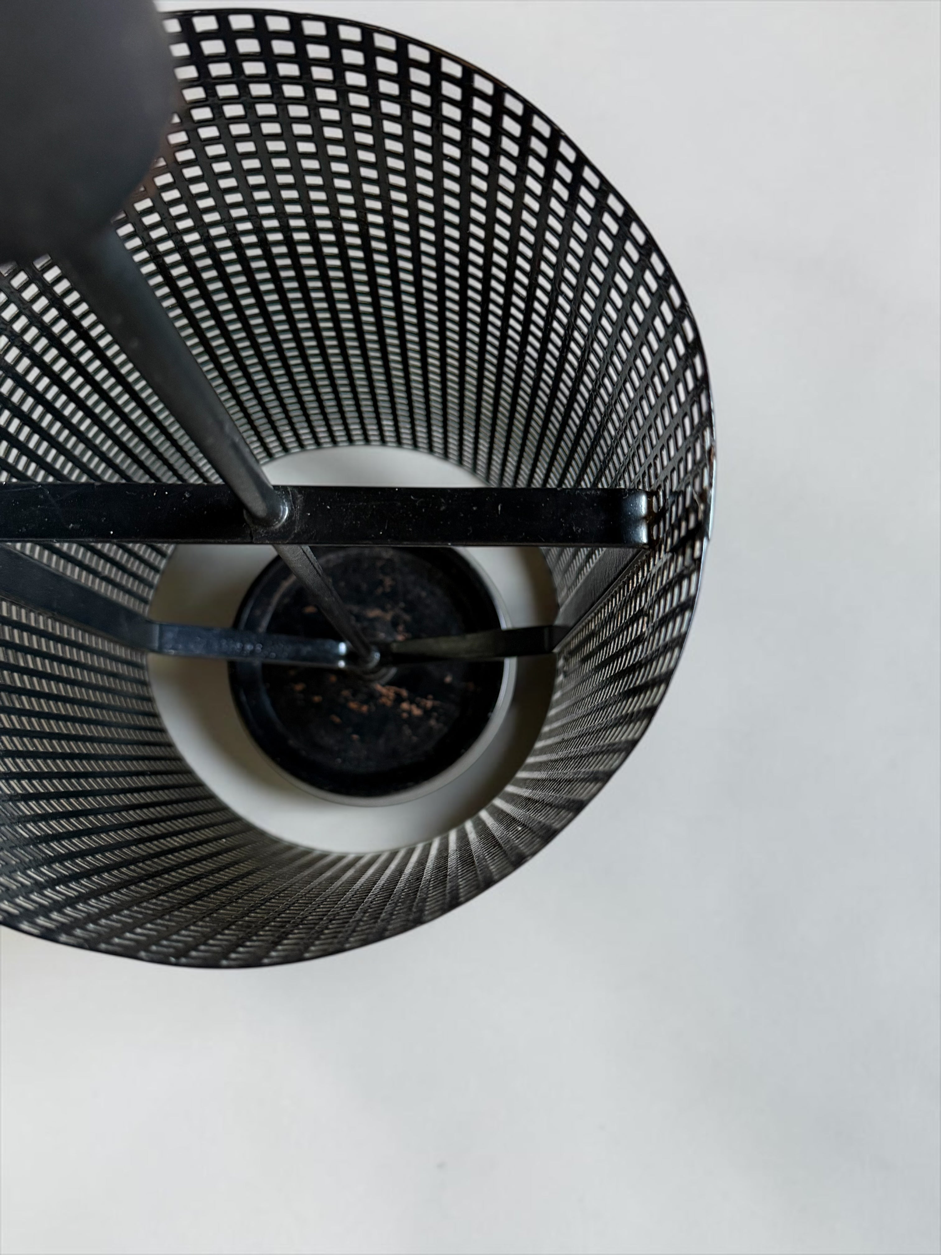 Minimalistic dutch design perforated metal umbrella stand